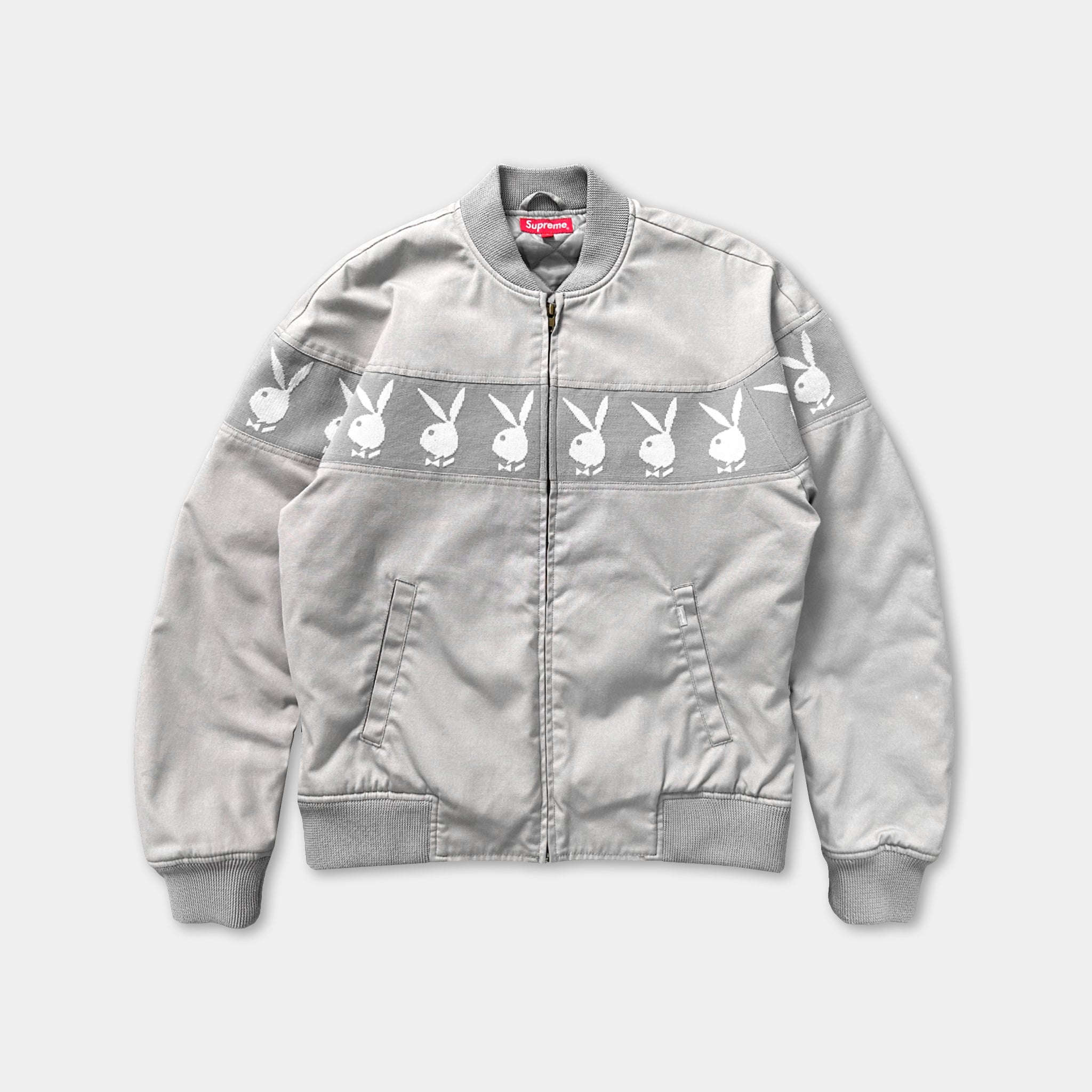 A gray jacket with white bunny designs on the front.