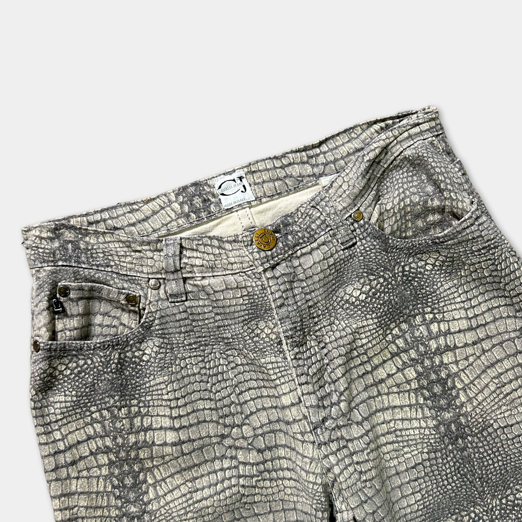 A pair of gray and white patterned jeans with a crocodile skin texture.