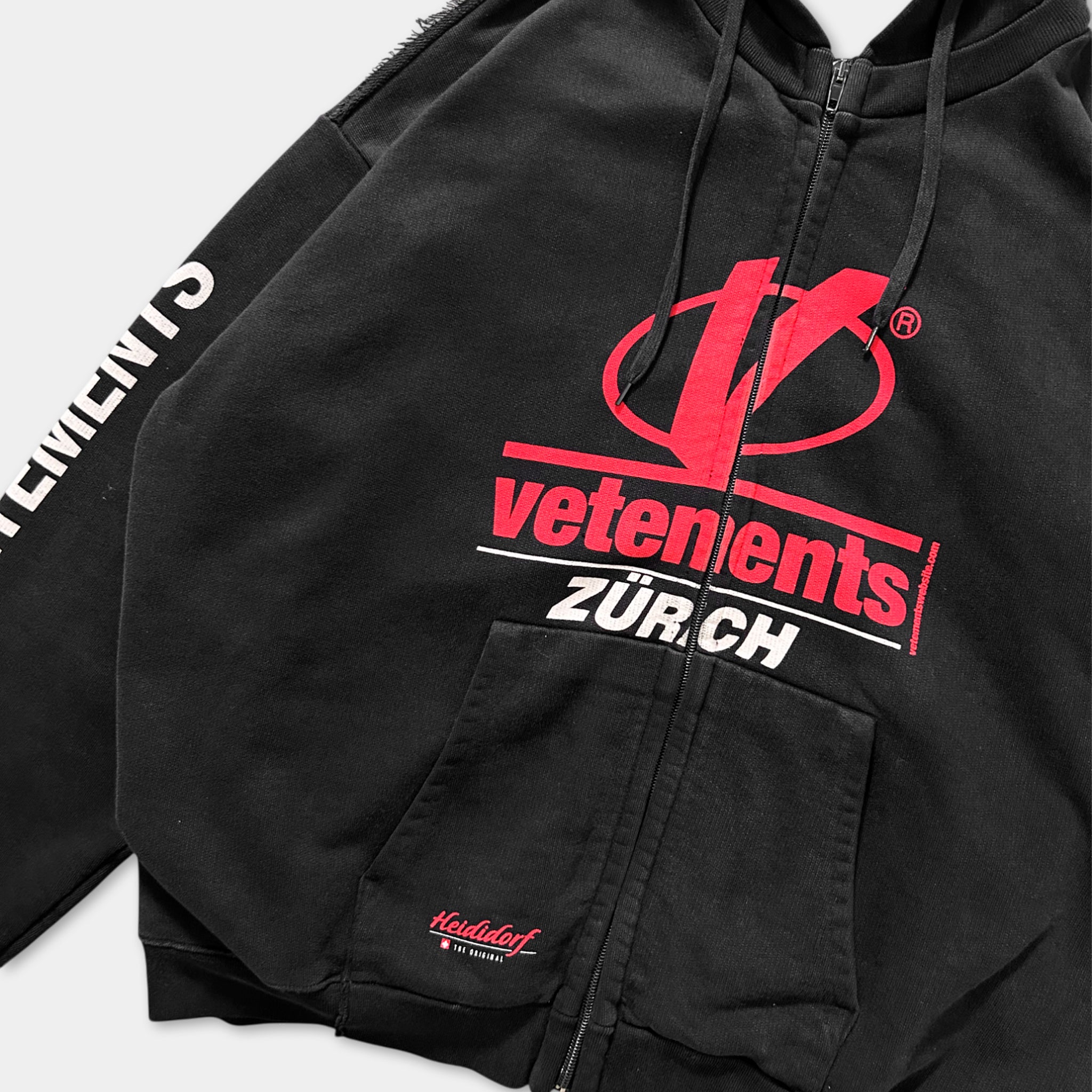 A black zip-up hoodie with the VETENENTS logo and the text "ZÜRCH" printed on it.