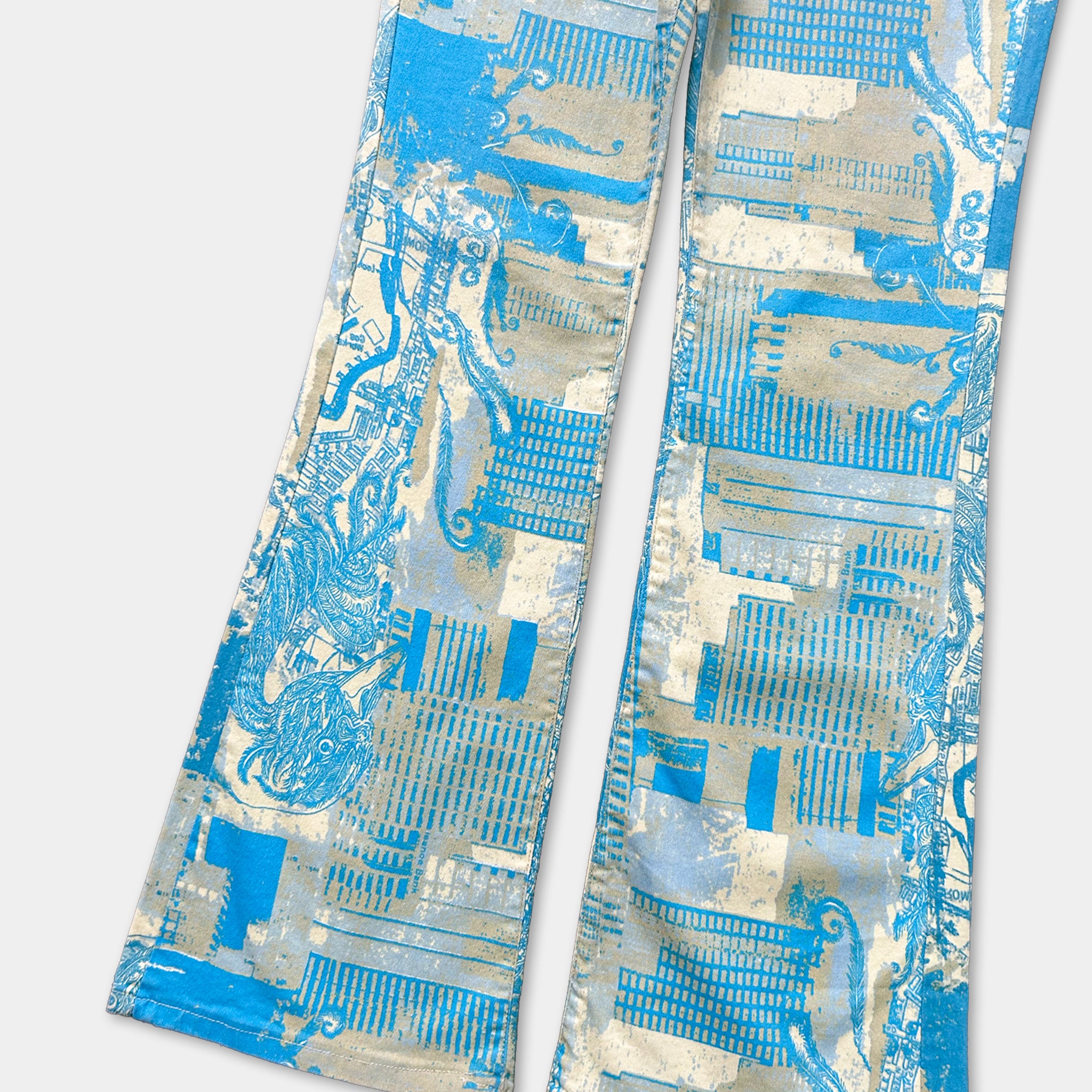 a pair of blue and white patterned jeans with a geometric design.