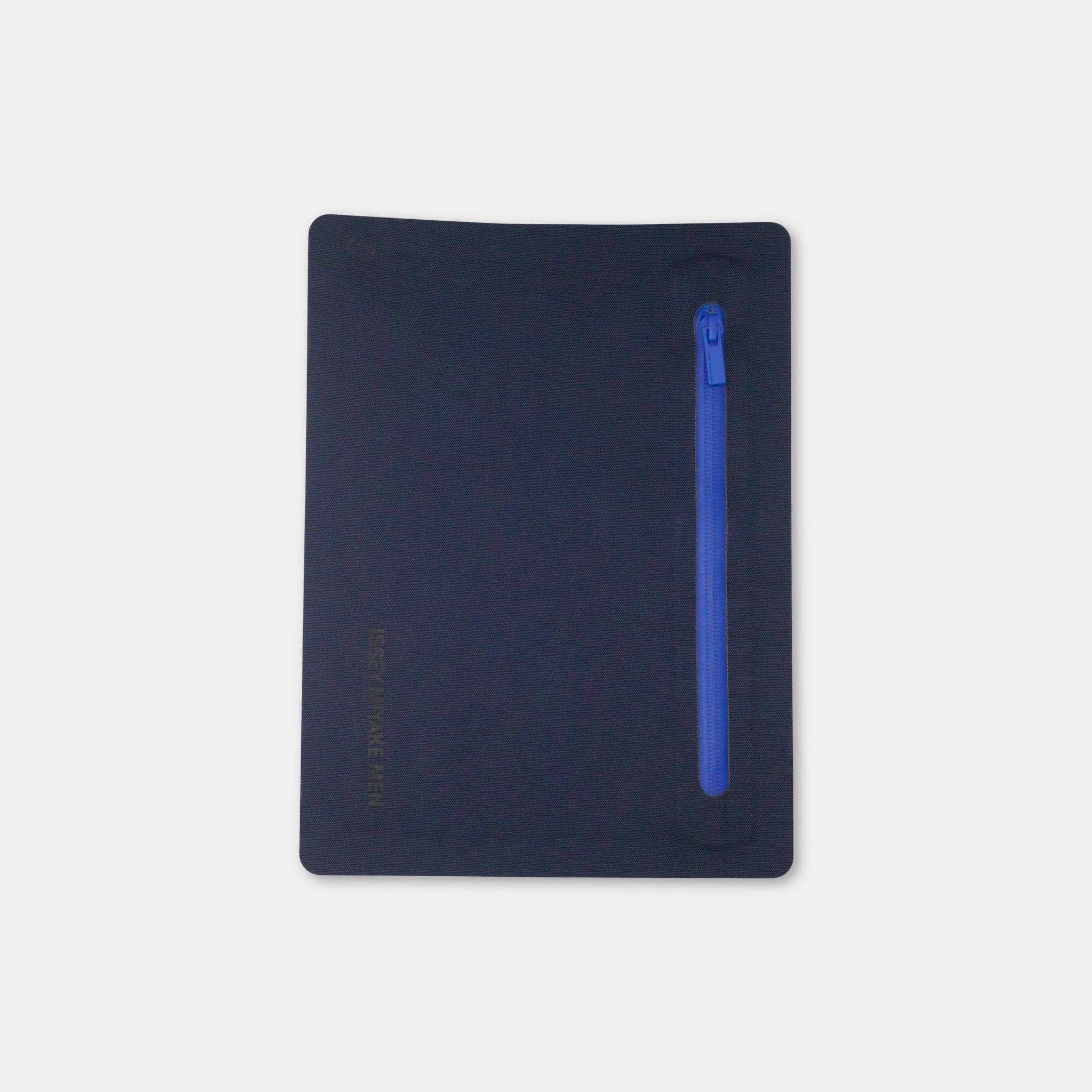 A dark blue object with a blue zipper on the right side.