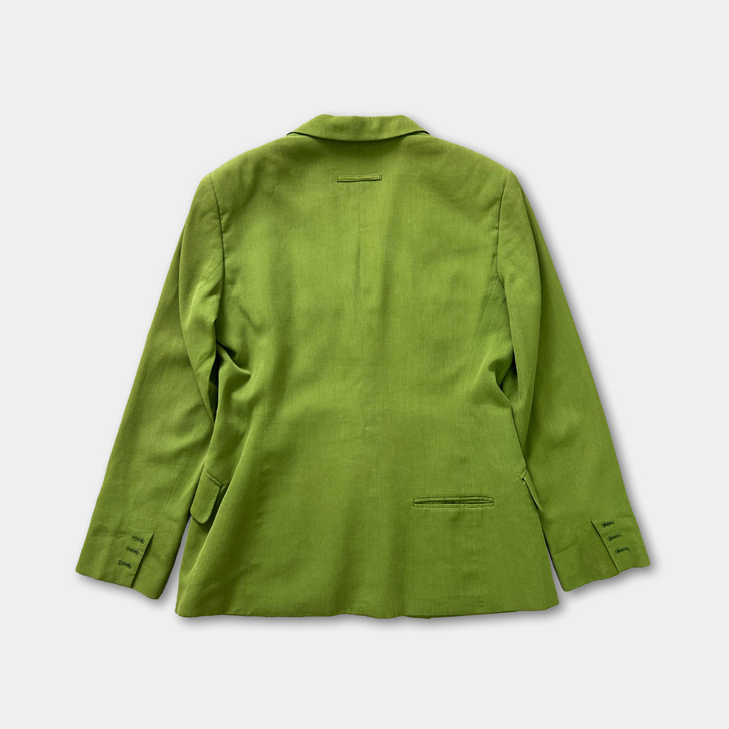 A bright green blazer is displayed against a white background.