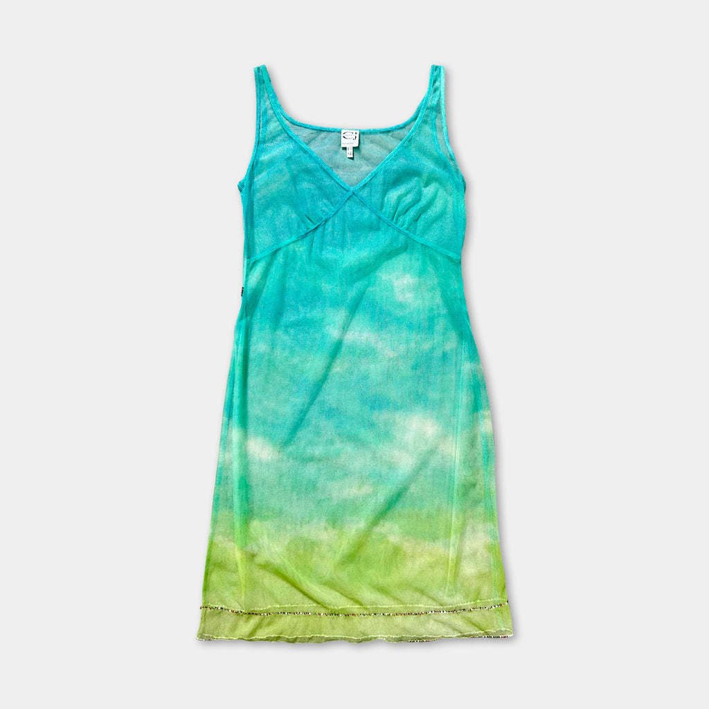 A turquoise and green tie-dye dress with a V-neck and a scoop neckline, displayed against a white background.