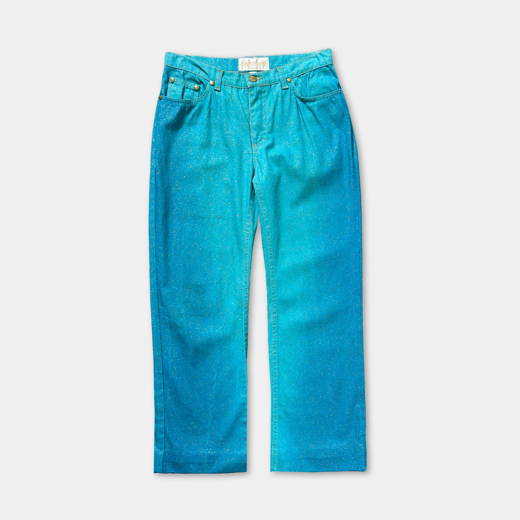 A pair of blue jeans with a glittery, sparkly effect.