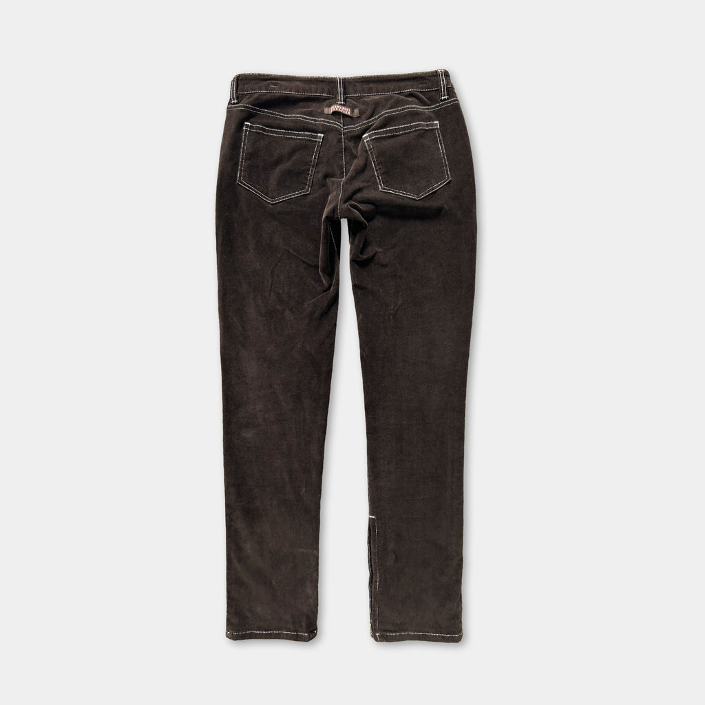 A pair of dark brown corduroy jeans with a zipper and pockets.