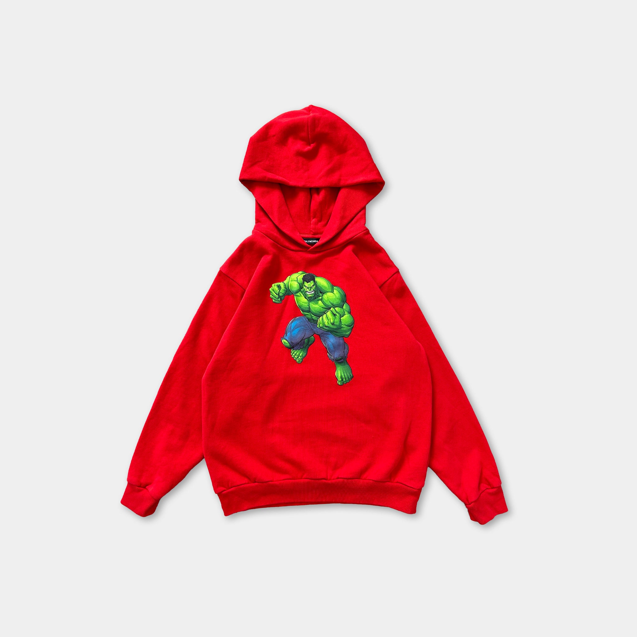 A red hooded sweatshirt with a graphic of a muscular green character on the front.