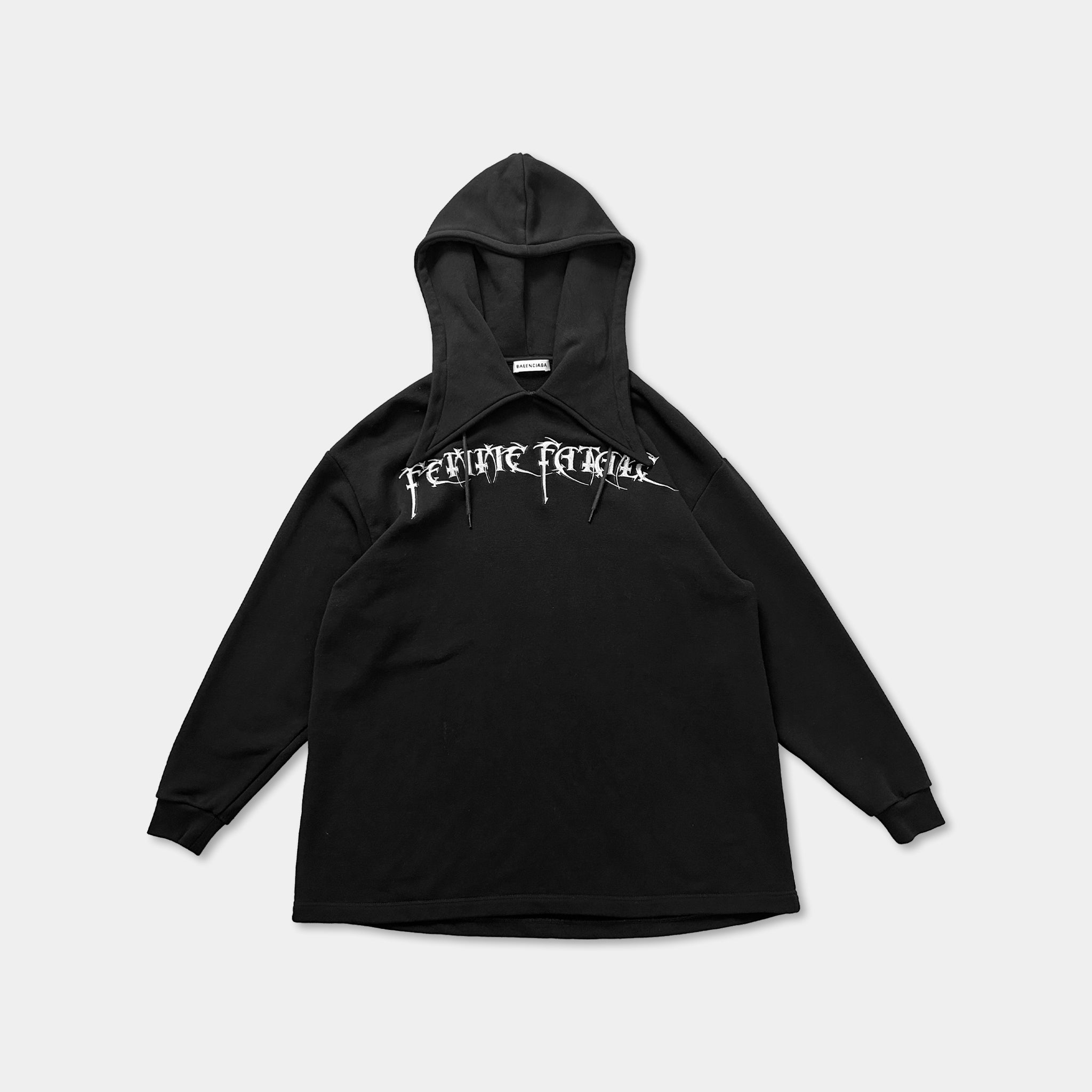 A black hooded sweatshirt with the text "Feline Feline" printed on it.