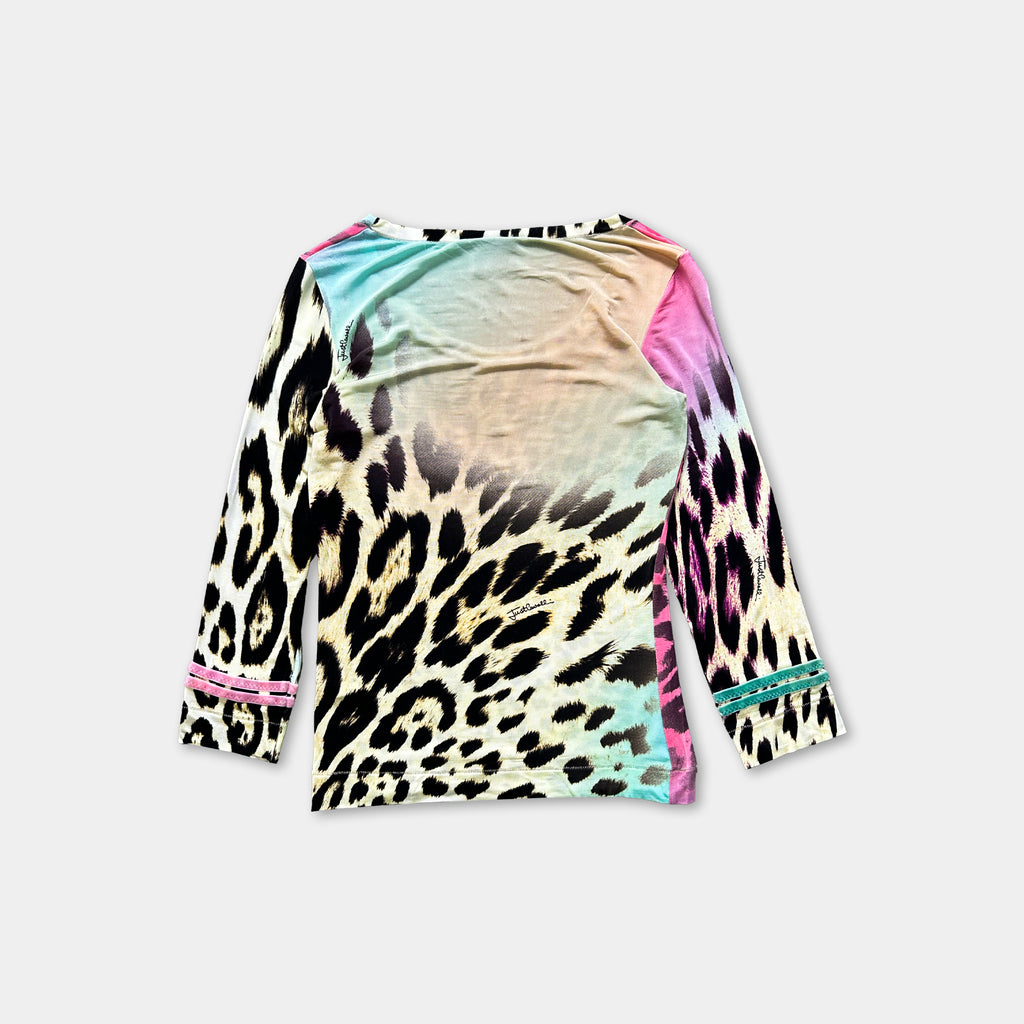 A colorful, patterned long-sleeved shirt with a leopard print design.
