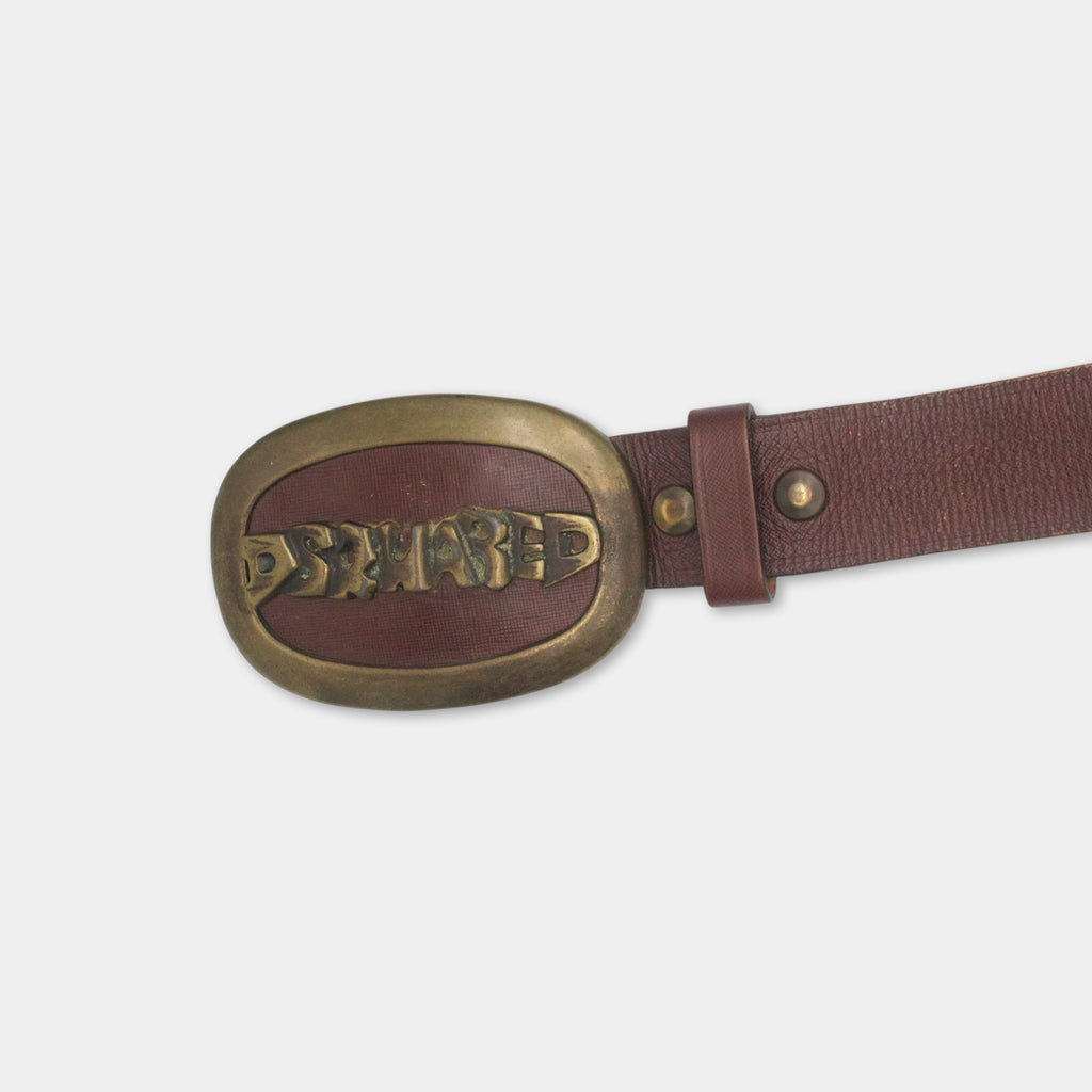 A brown leather belt with a metal buckle displaying the word "D'Swarz".