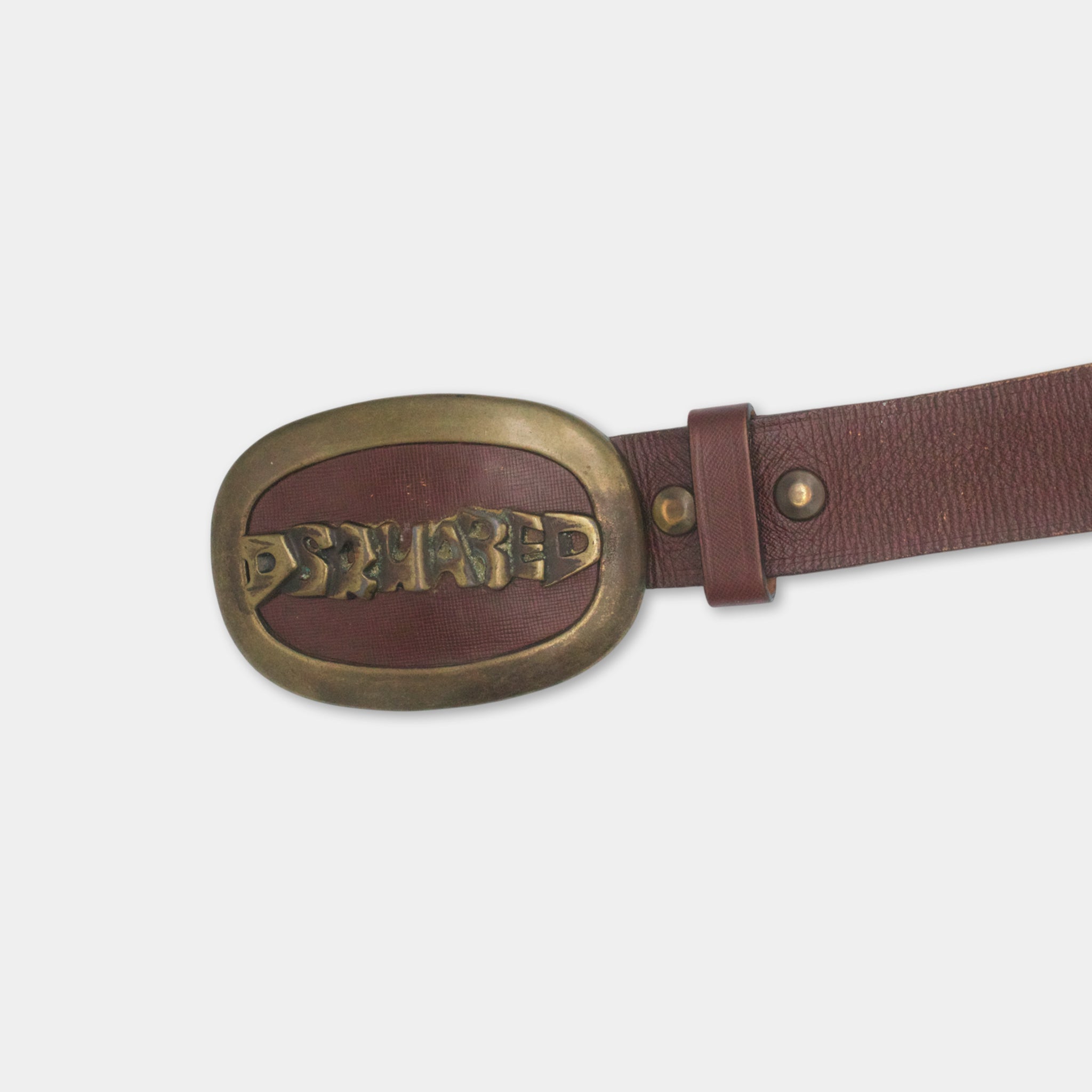 A brown leather belt with a metal buckle displaying the word "D'Swarz".