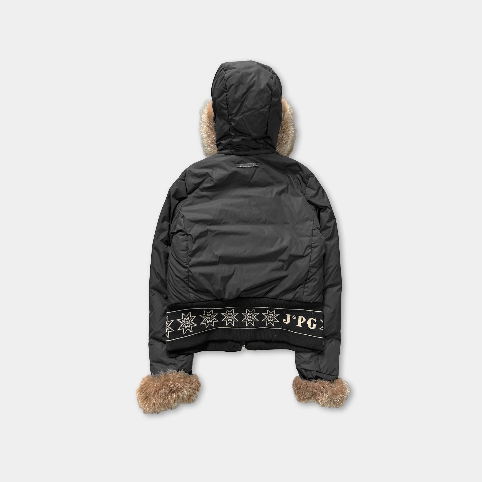 A black winter coat with fur trim and a hood, featuring a logo on the back.