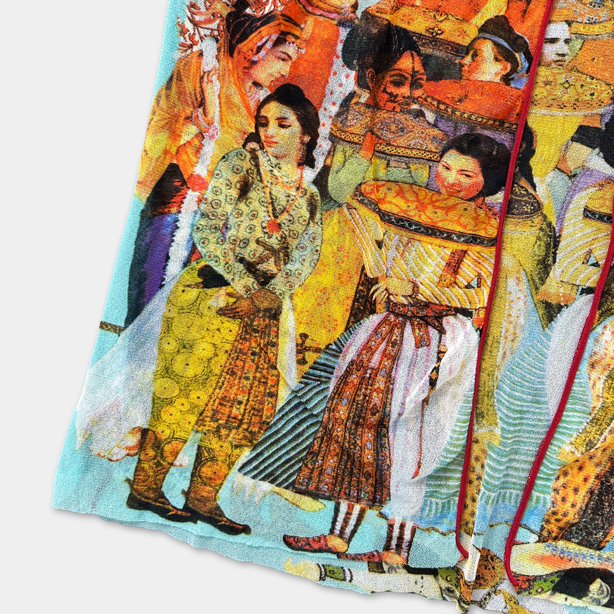 The image is a vibrant collage featuring a variety of colorful and intricate patterns, including traditional Indian clothing and other cultural elements.