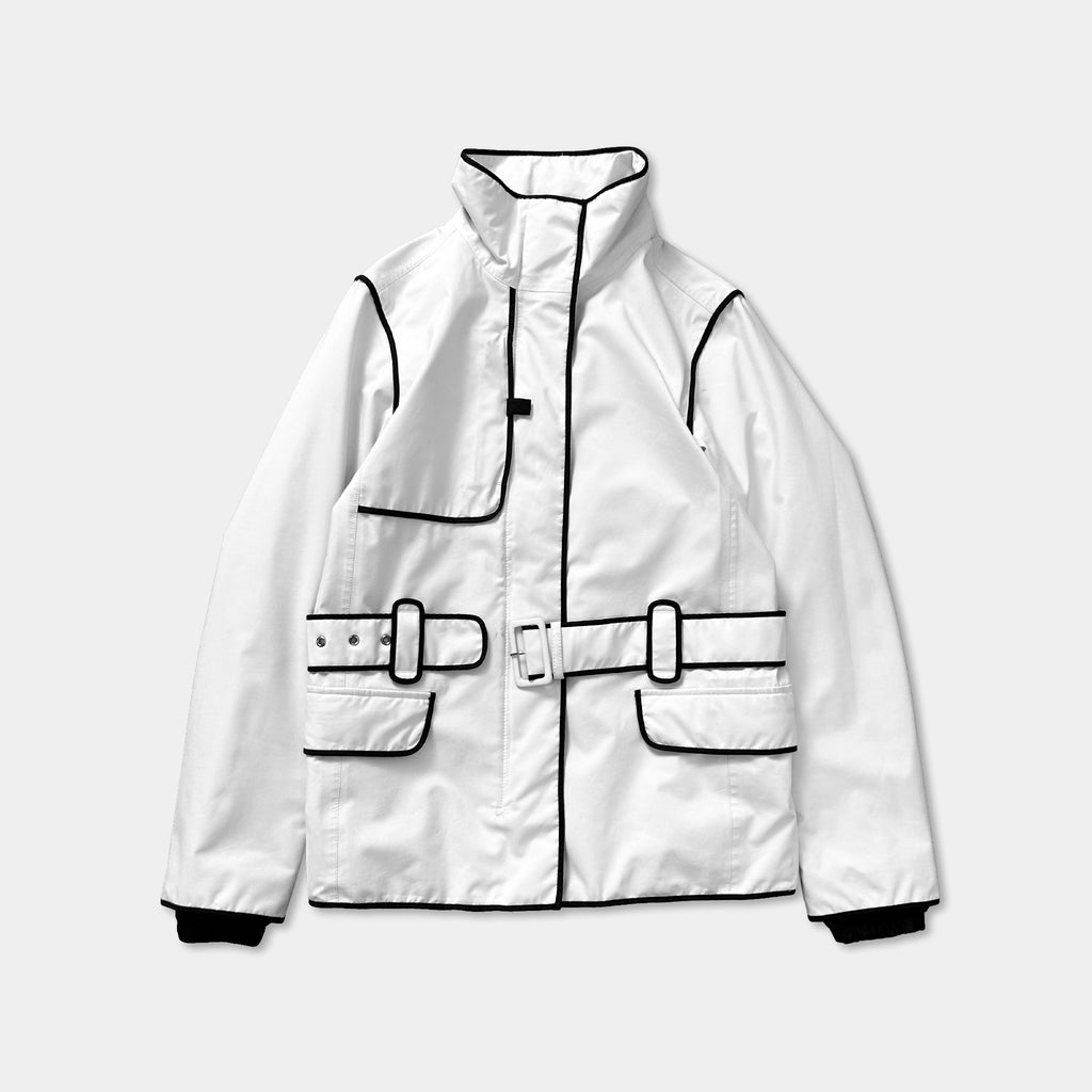 A white jacket with black trim and buckles, featuring a high collar and two pockets.