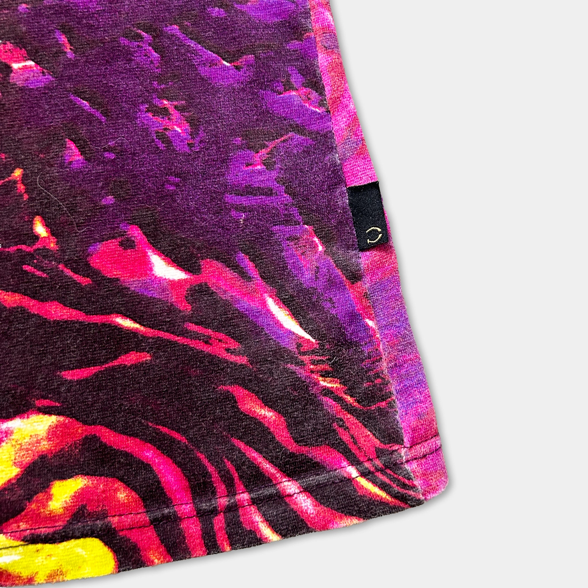 a vibrant, colorful pattern with a mix of purple, pink, and yellow hues.