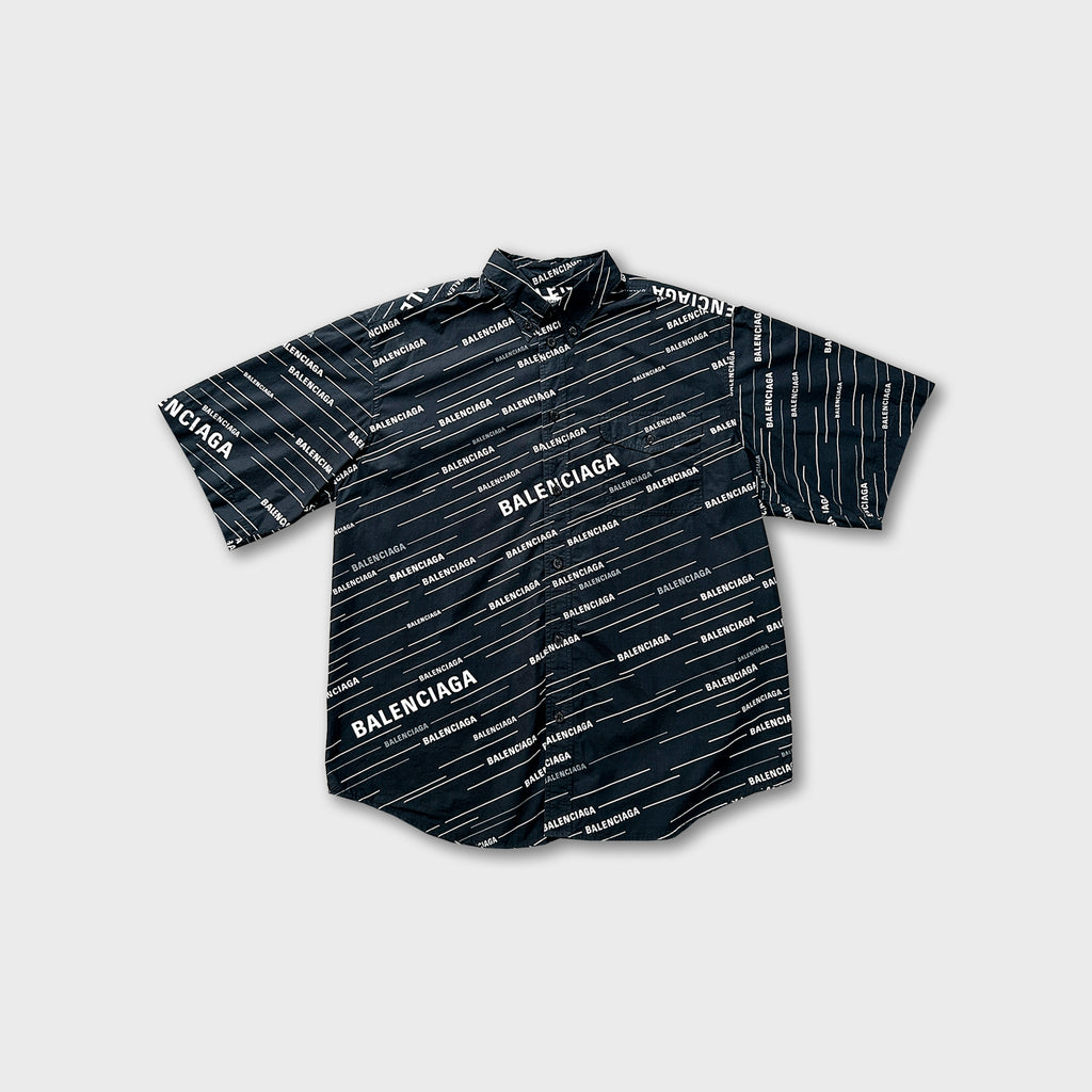 A black and white patterned shirt with the word "BALENCIA" printed on it.
