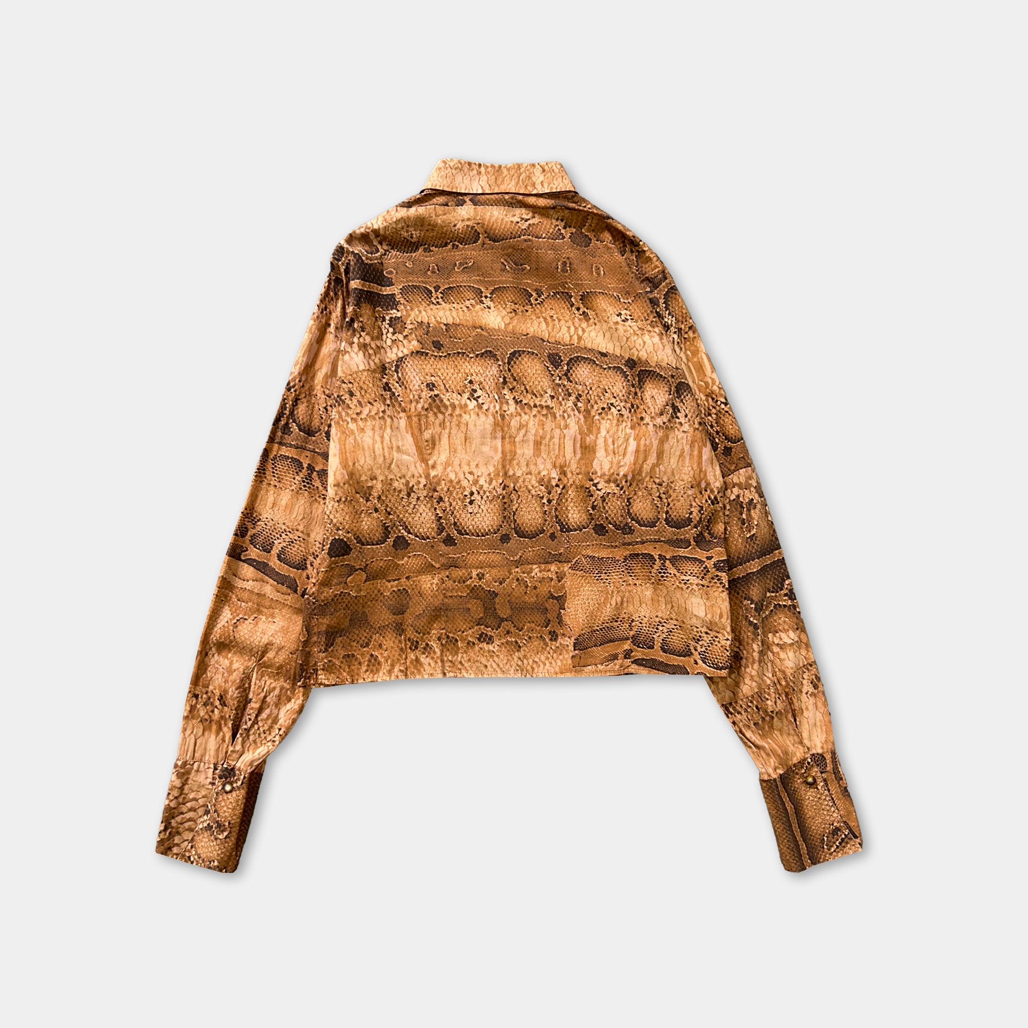 a brown patterned long-sleeved shirt with a collar, laid out against a white background.