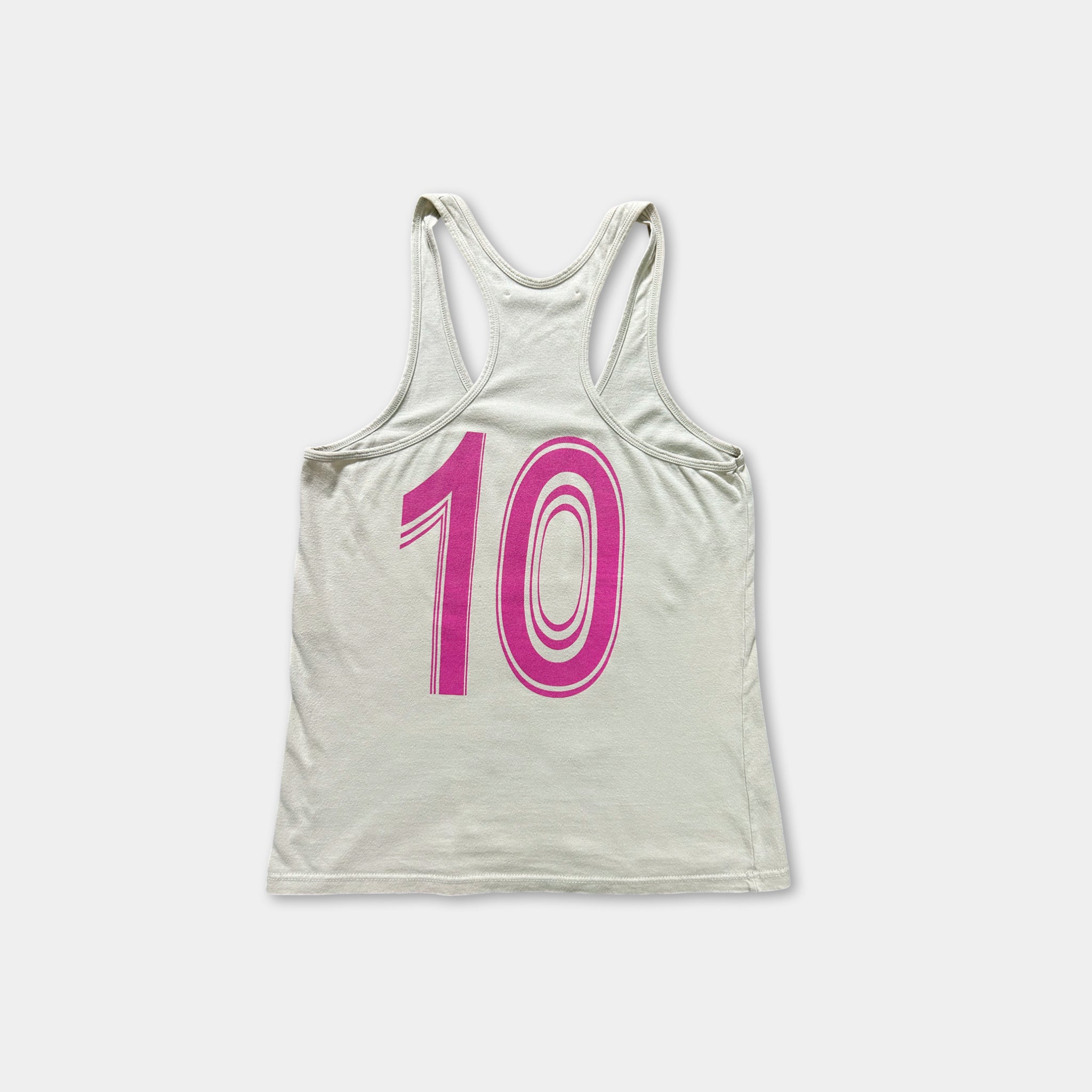 A white tank top with the number 10 in pink printed on it.