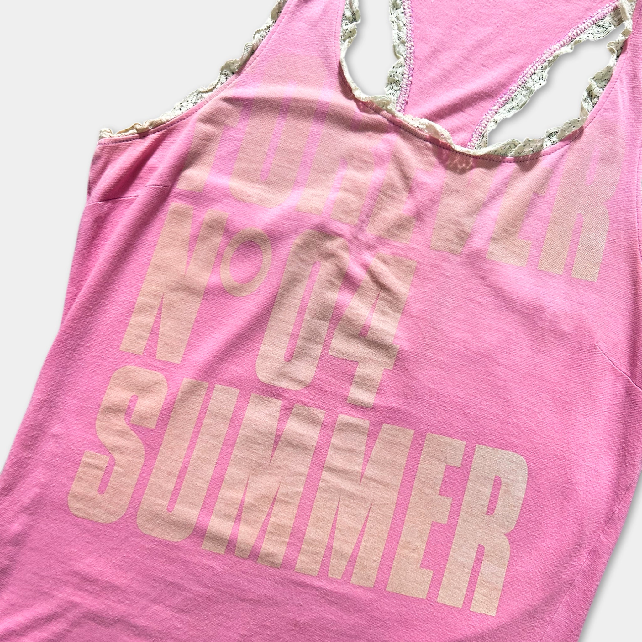 A pink tank top with the text "SUMMER" printed on it.
