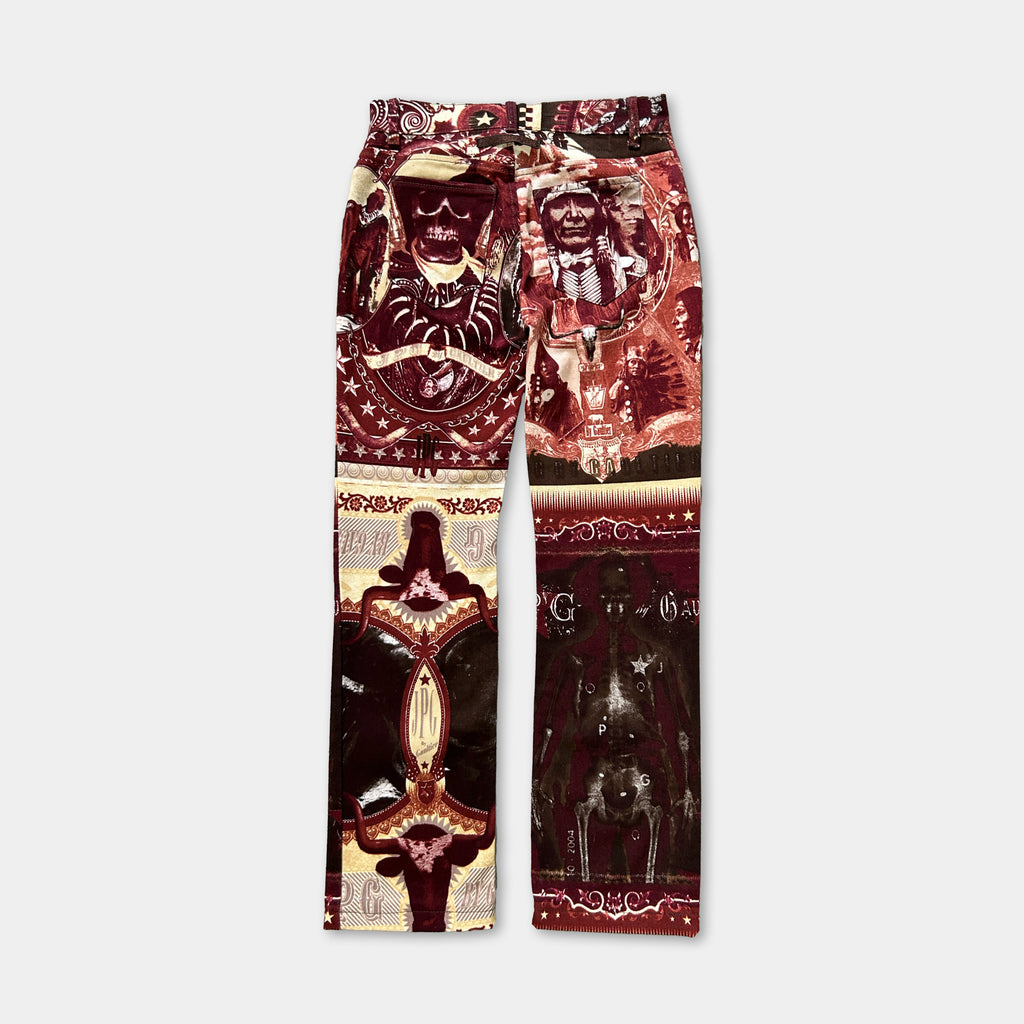 a pair of pants with a vibrant, colorful, and intricate design. The pants are adorned with various patterns and images, including a central figure surrounded by smaller images and designs. The overall appearance of the pants is visually striking and eye-catching.