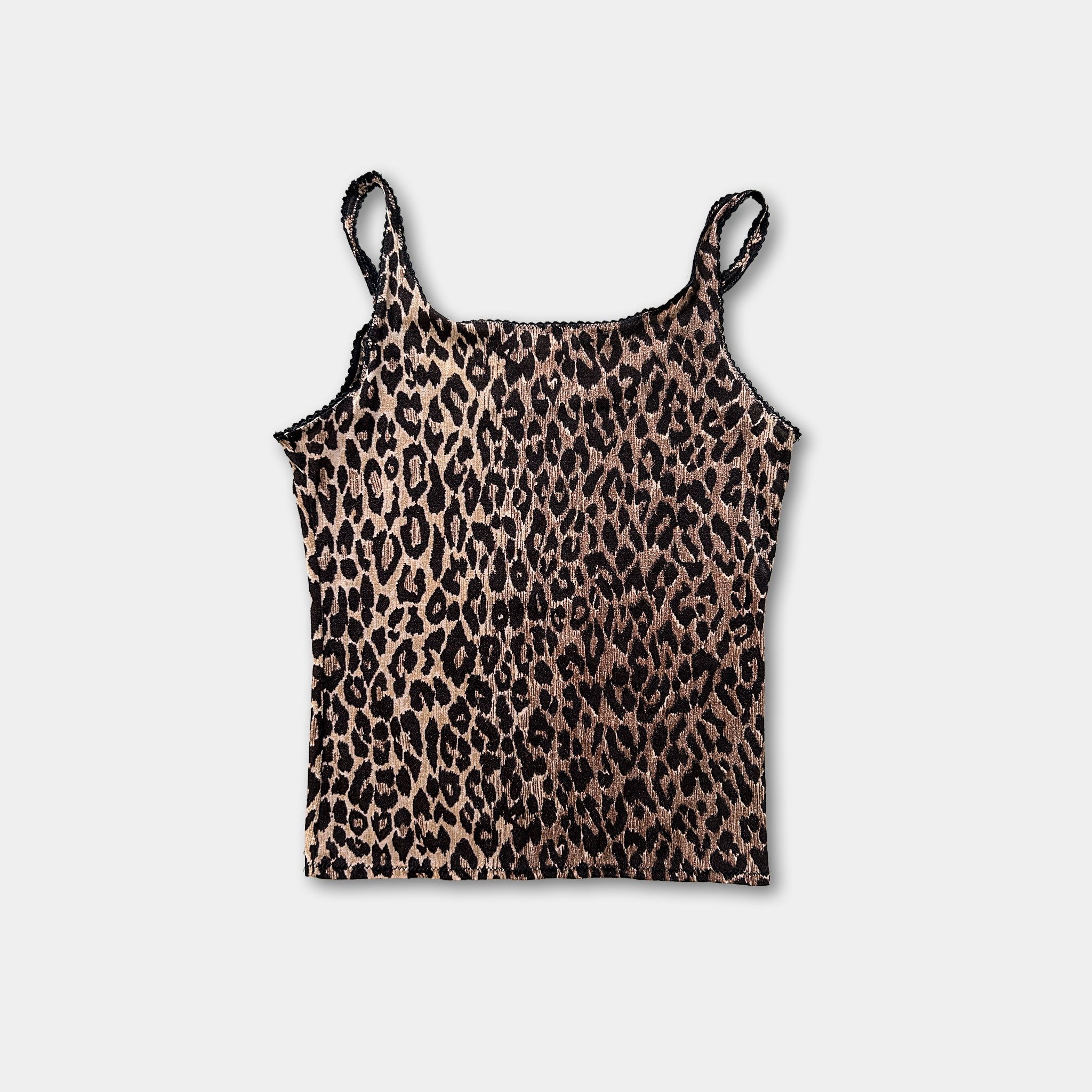 A leopard print tank top is shown against a white background.