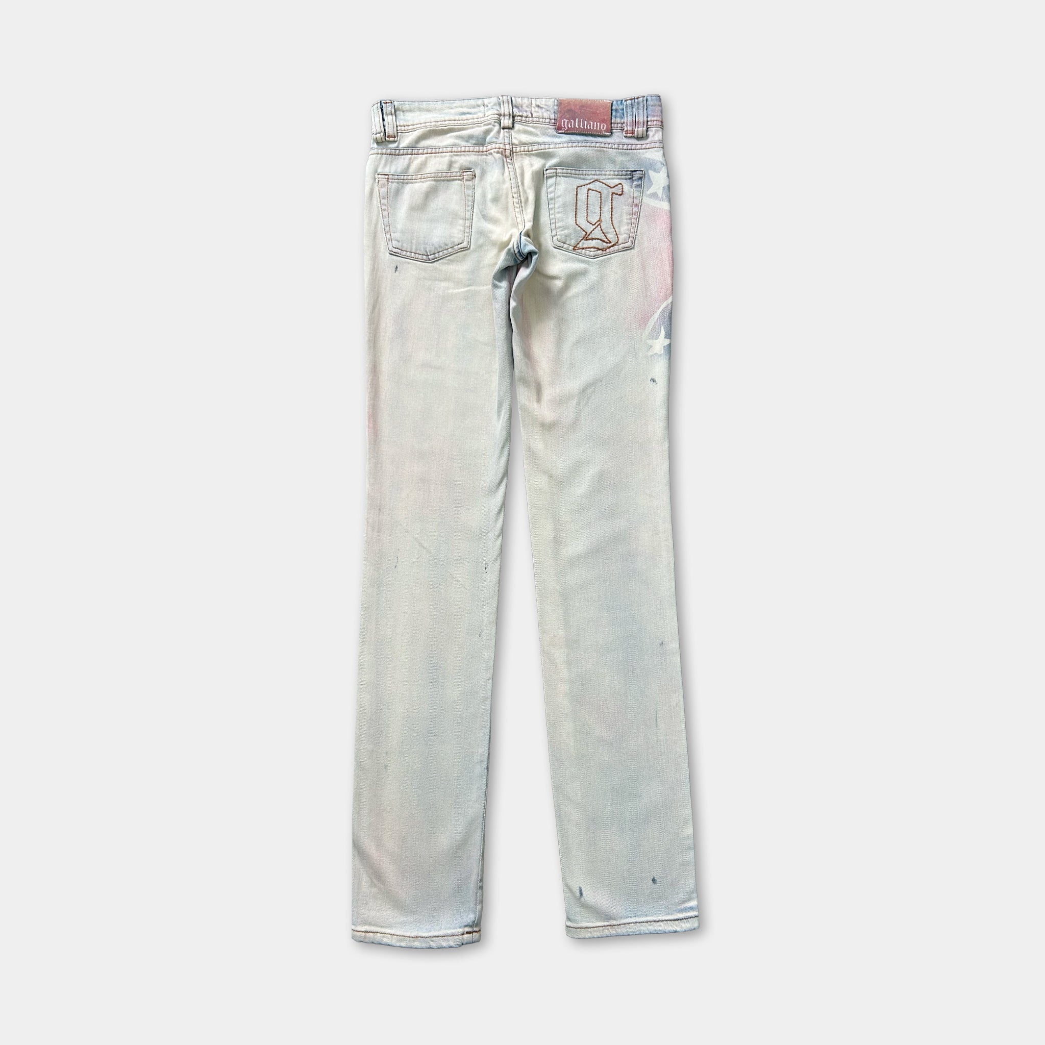A pair of light blue denim jeans with a faded, distressed appearance.
