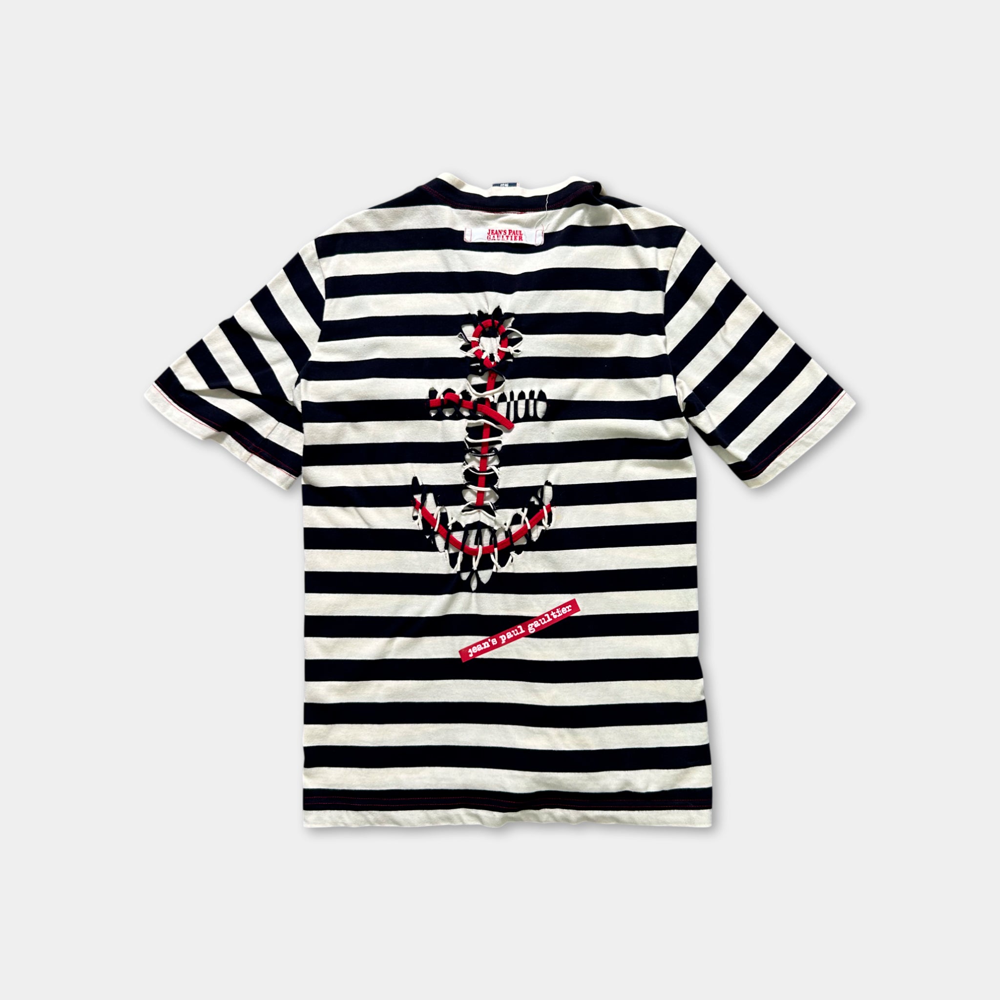 A black and white striped t-shirt with a graphic design of a flower and the text "JOE'S BRO" printed on it.
