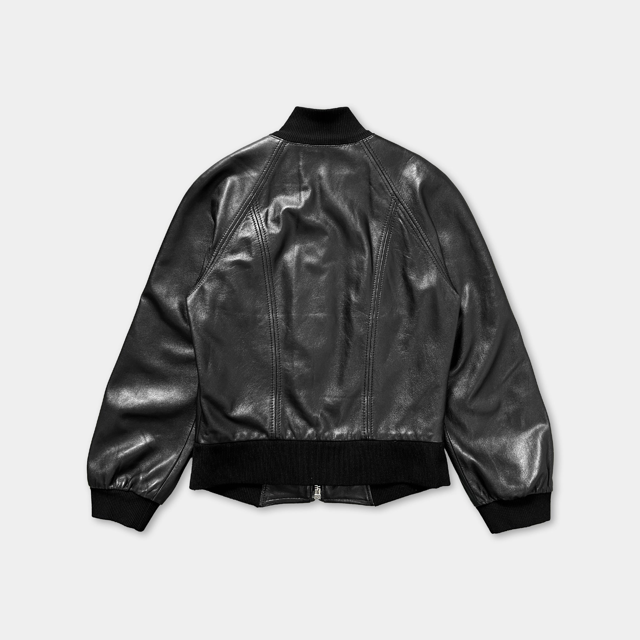 A black leather jacket with a high collar and long sleeves, displayed against a white background.