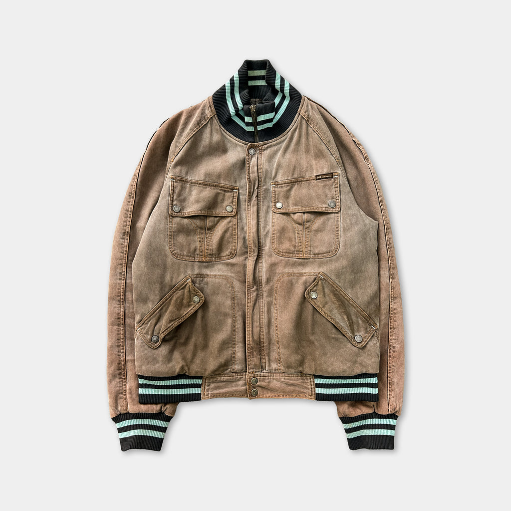 A brown jacket with a black collar and green stripes, featuring two pockets and a zipper closure.