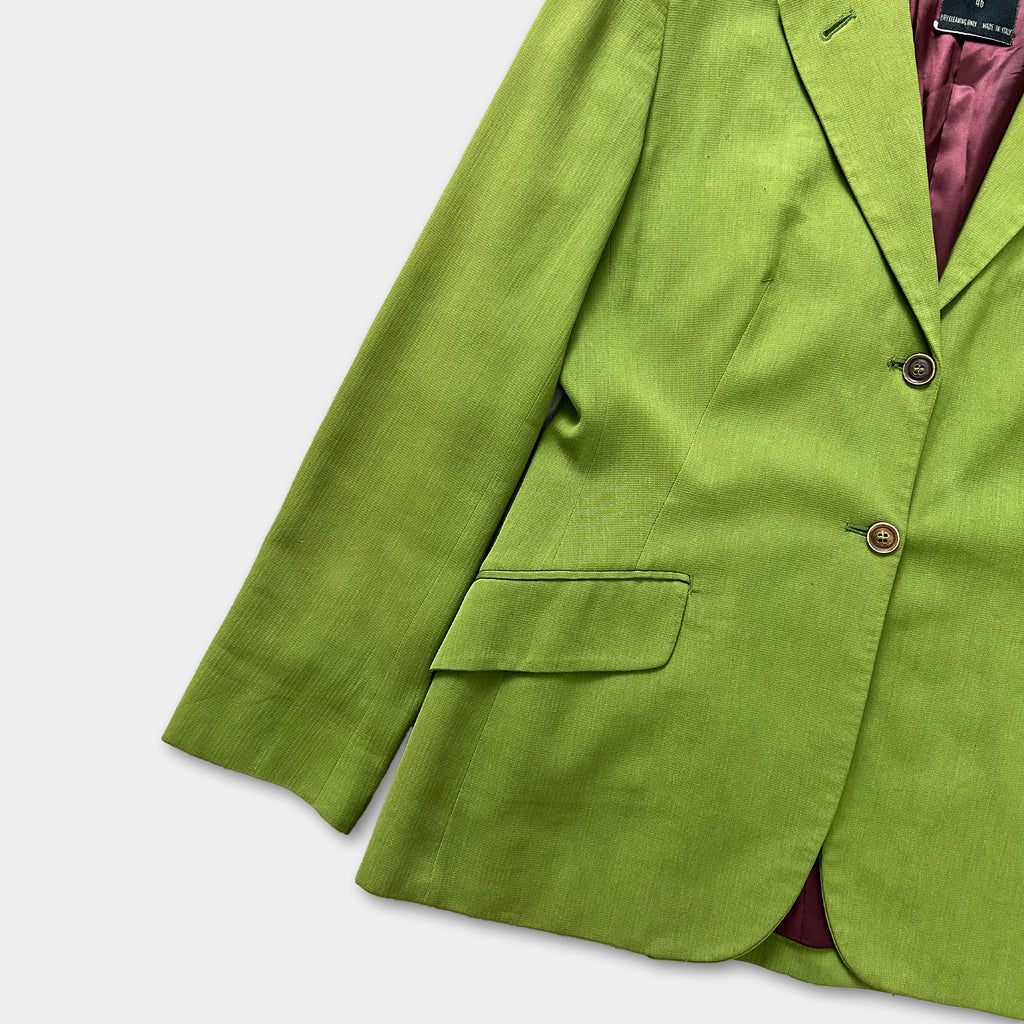 A bright green blazer with a button-down front and long sleeves is displayed against a white background.