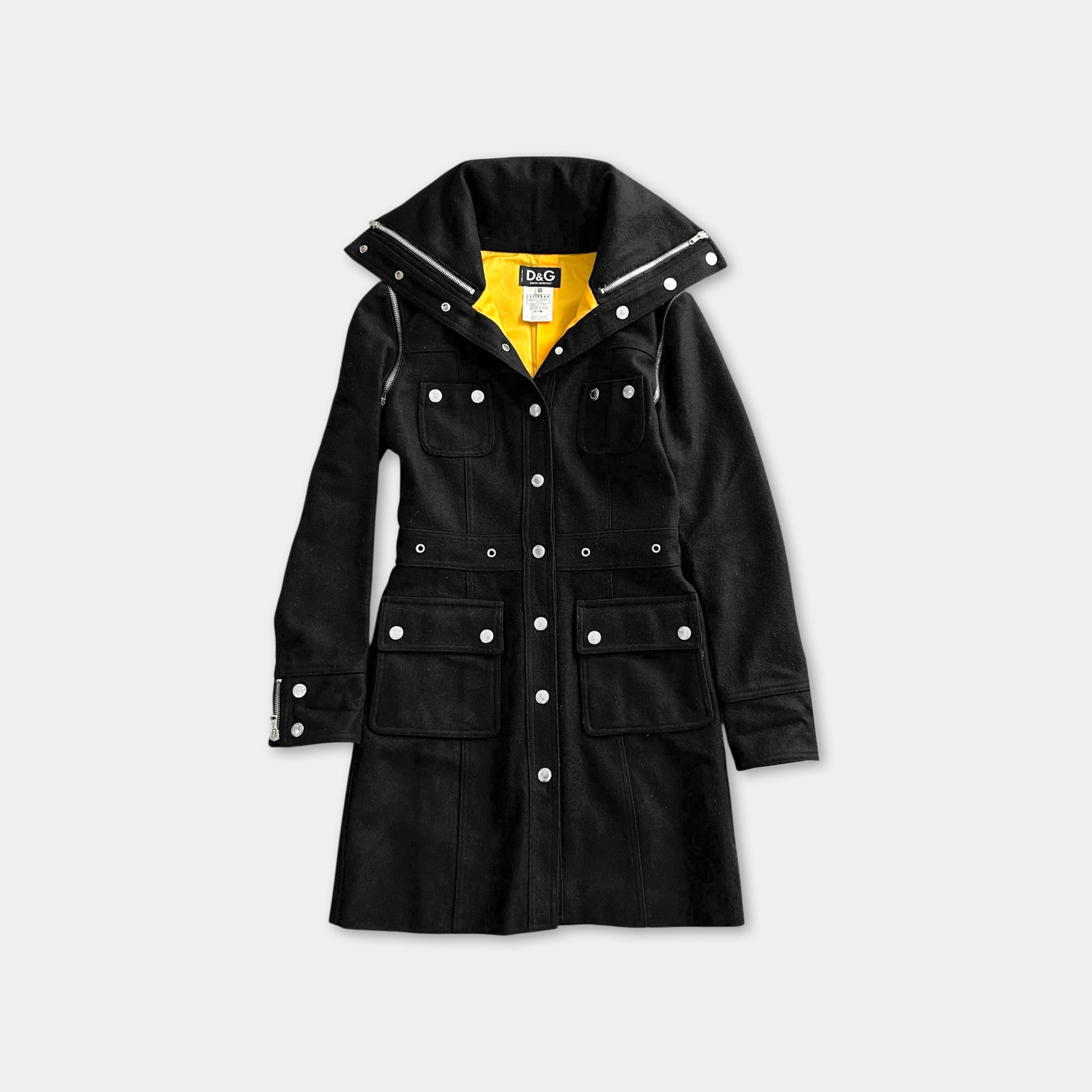 A black coat with a yellow lining and buttons, displayed against a white background.