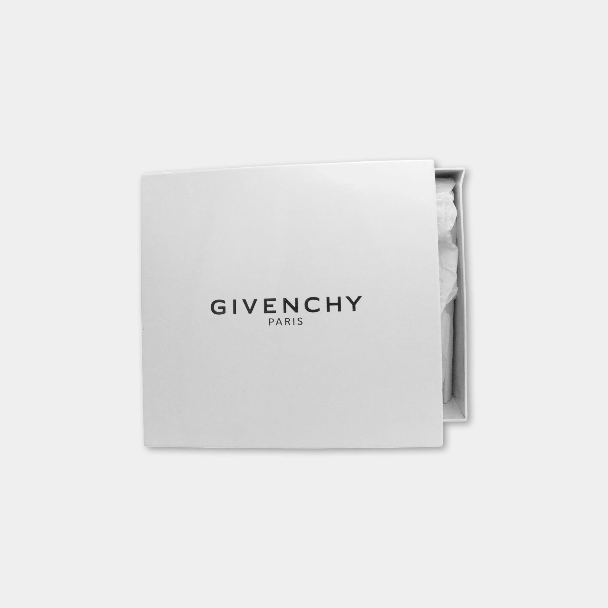 A white box with the Givenchy logo printed on it.