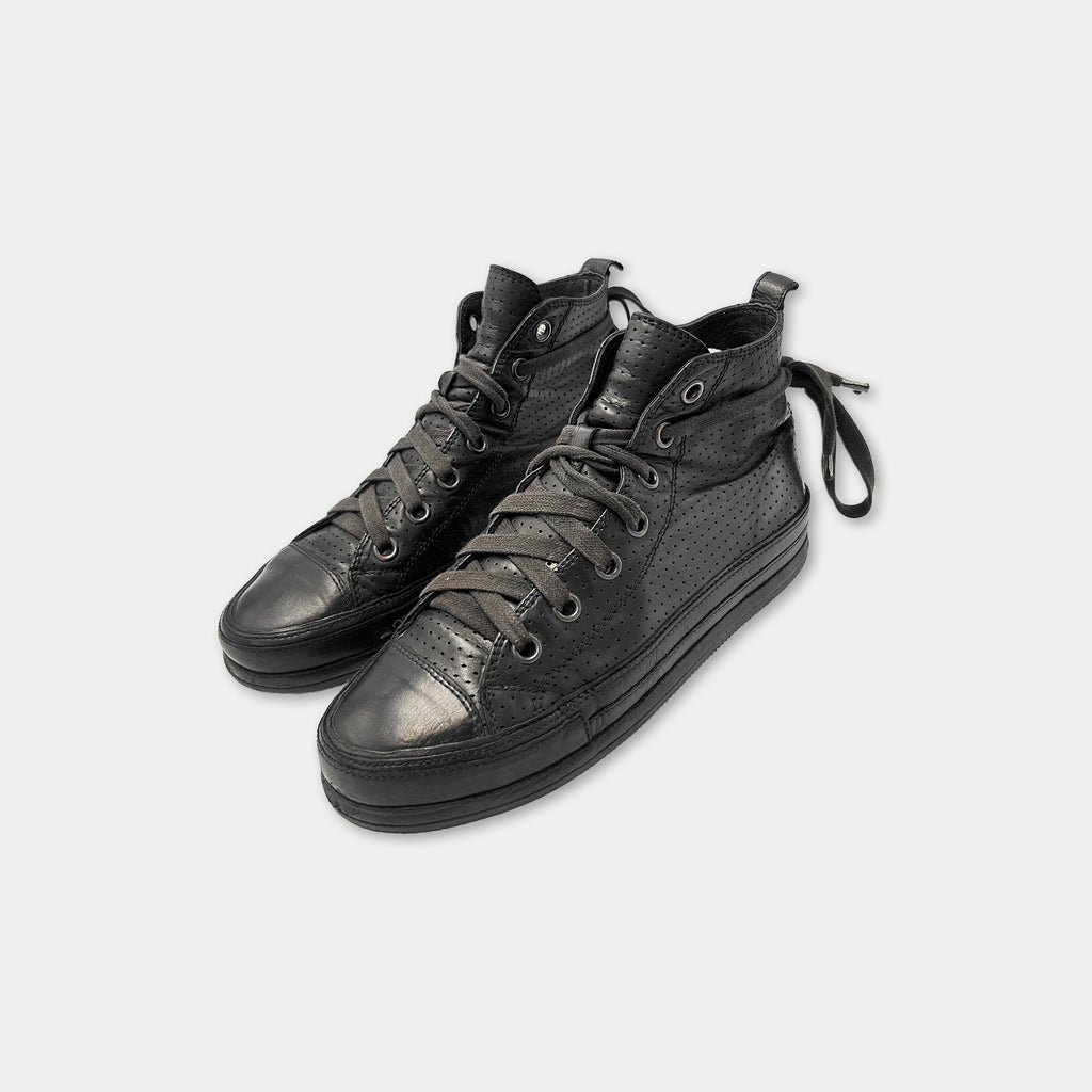 A pair of black high-top sneakers with laces and a high top design.