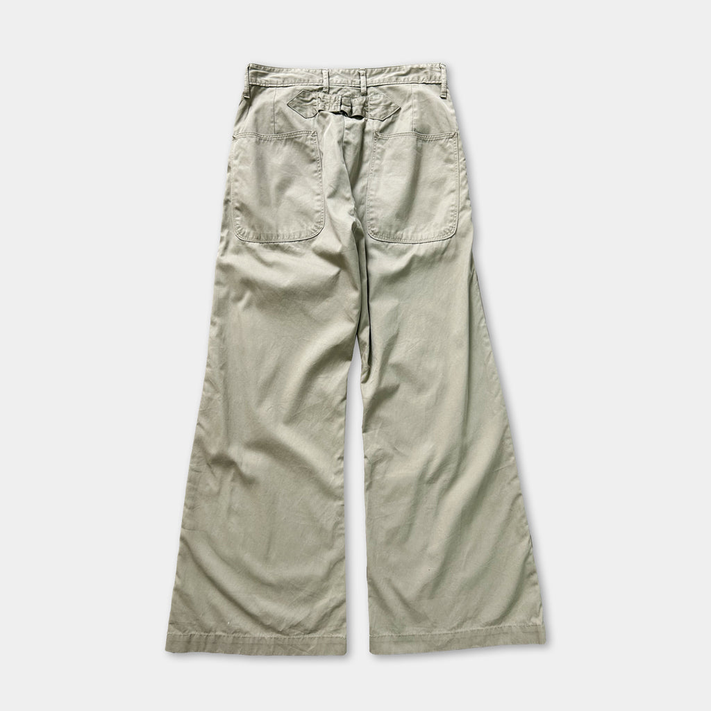 A pair of khaki cargo pants with wide legs and a high waistband.