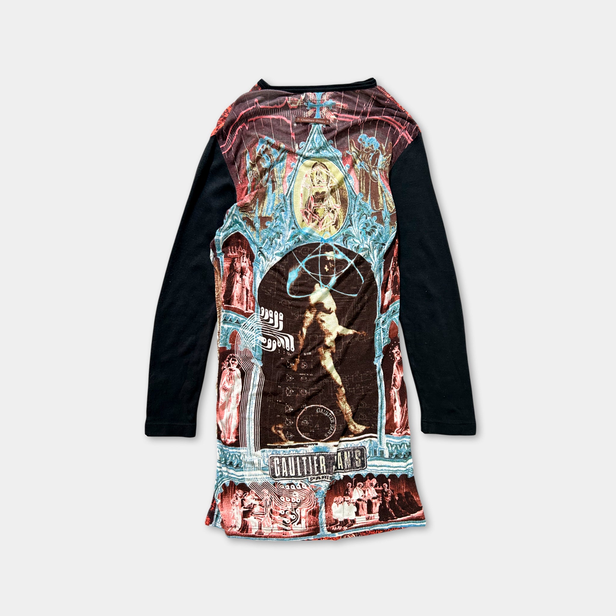 The image is a colorful, patterned long-sleeve shirt with a variety of images and designs on the front.