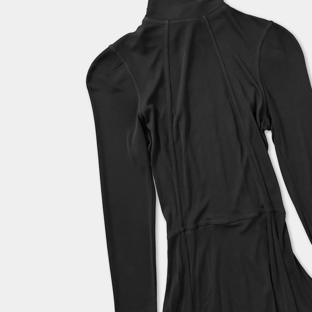 A black long-sleeved top or dress is shown against a white background.