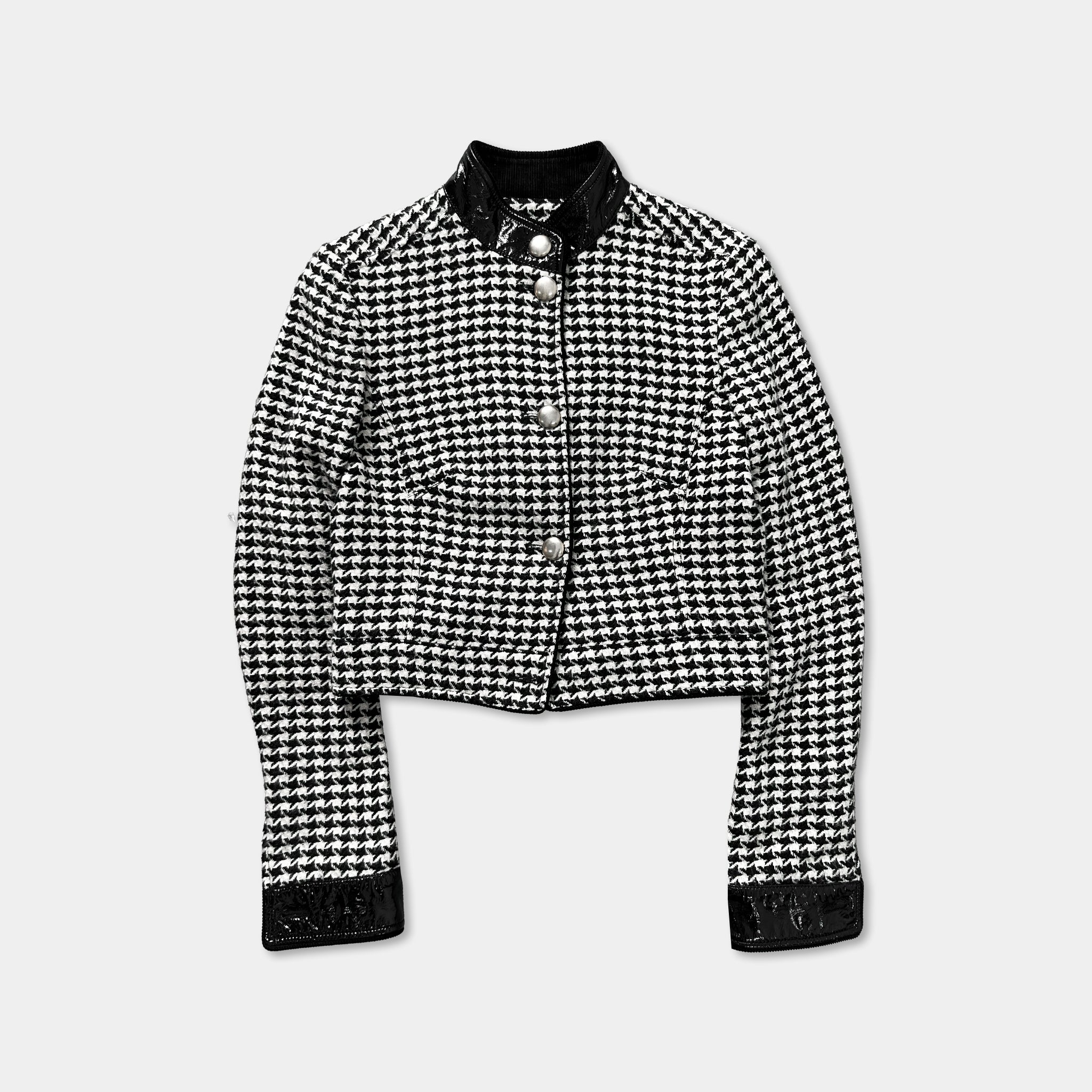 A black and white checkered jacket with a collar and buttons, displayed against a plain background.