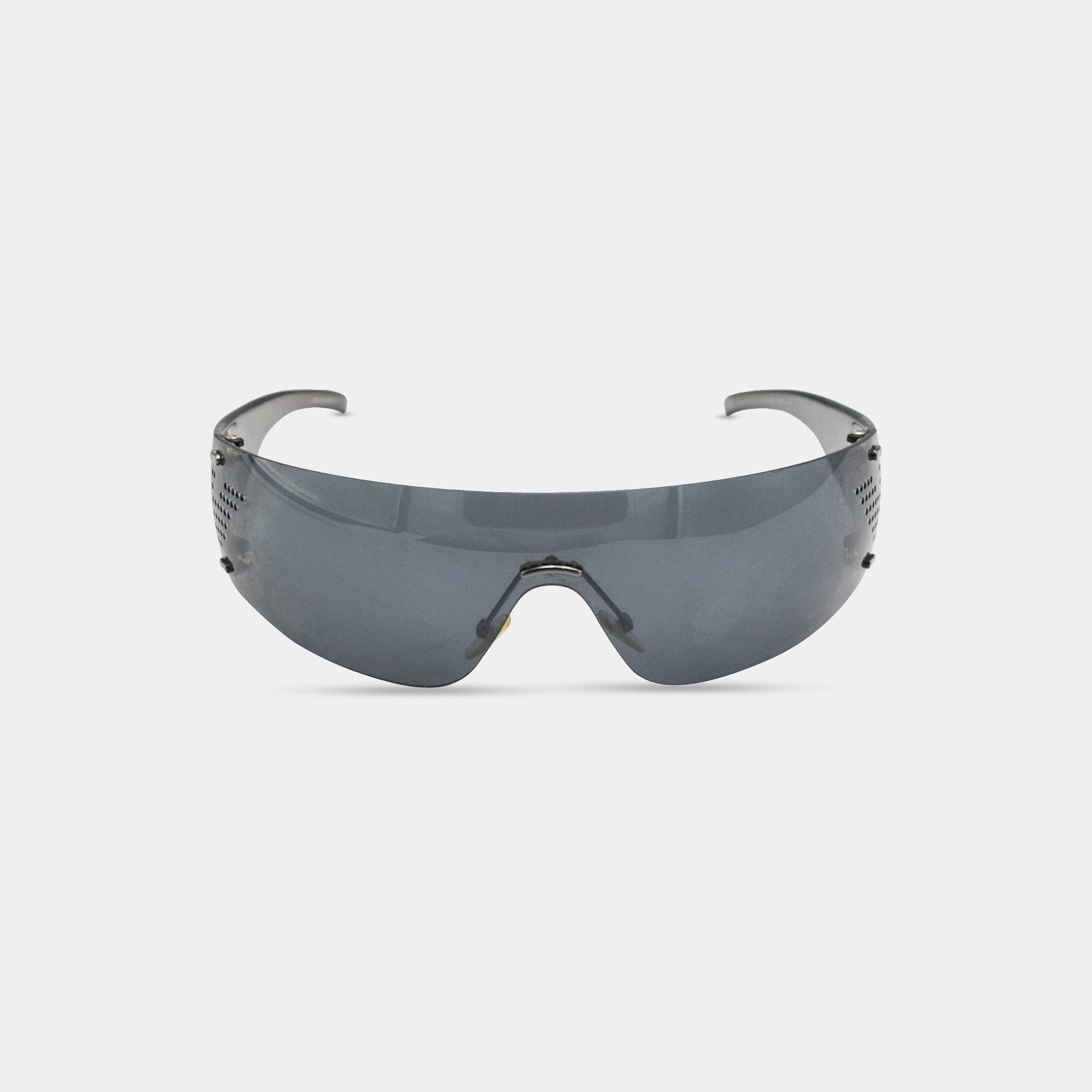 A pair of dark-colored sunglasses with a sleek, modern design.