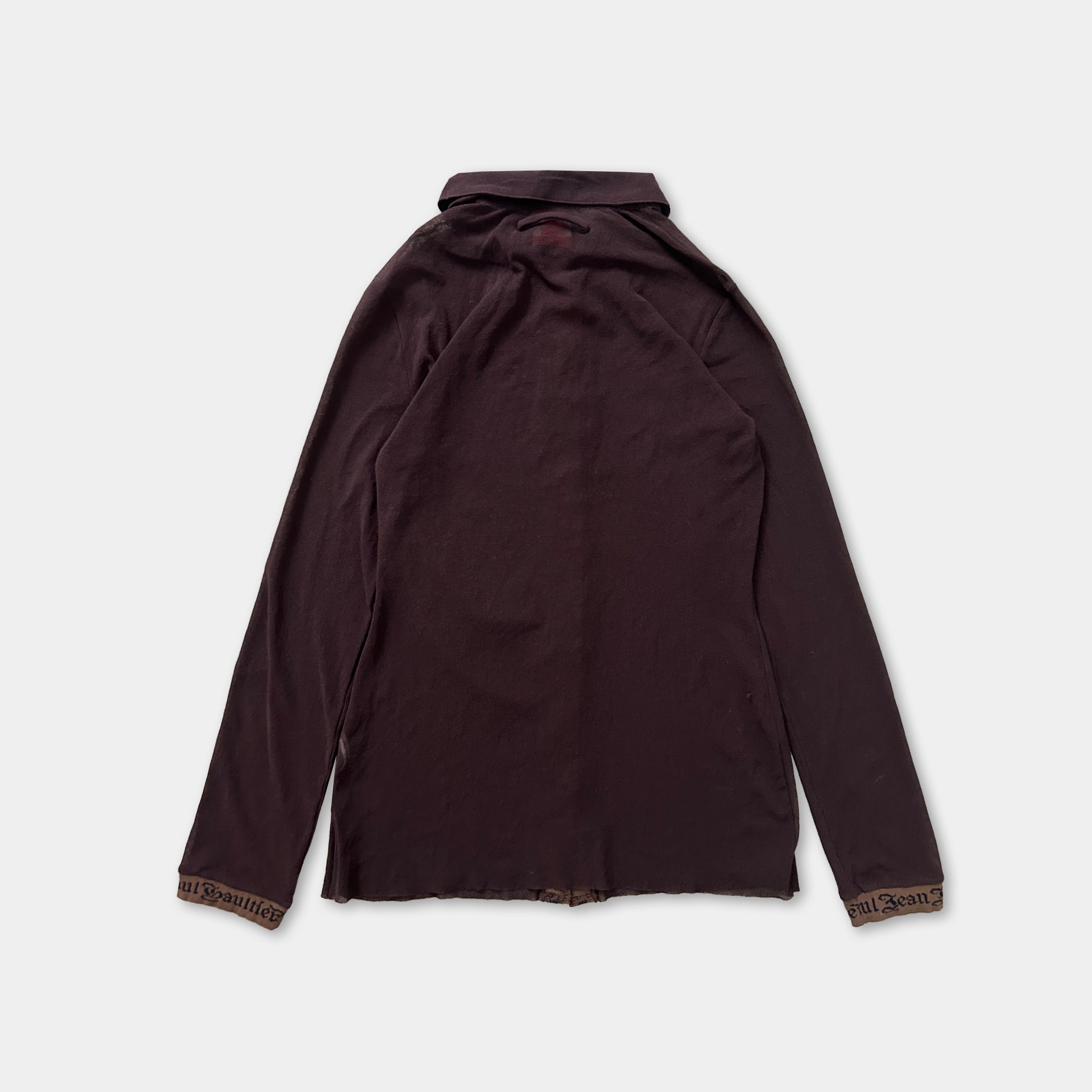 a dark-colored long-sleeved shirt or jacket with a collar, laid out against a white background.