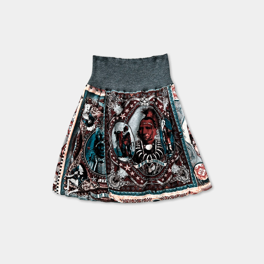 a colorful, patterned skirt with various designs and images on it.