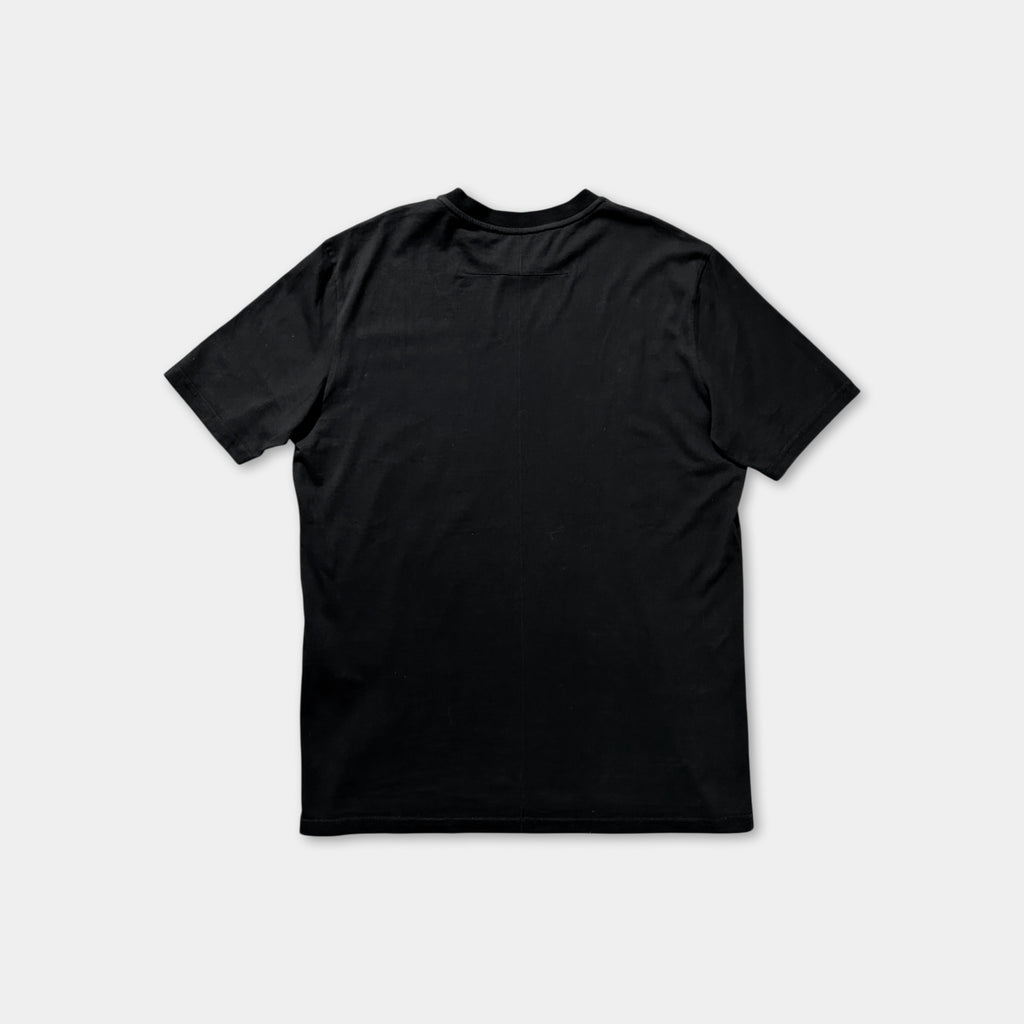 A black t-shirt is shown against a white background.