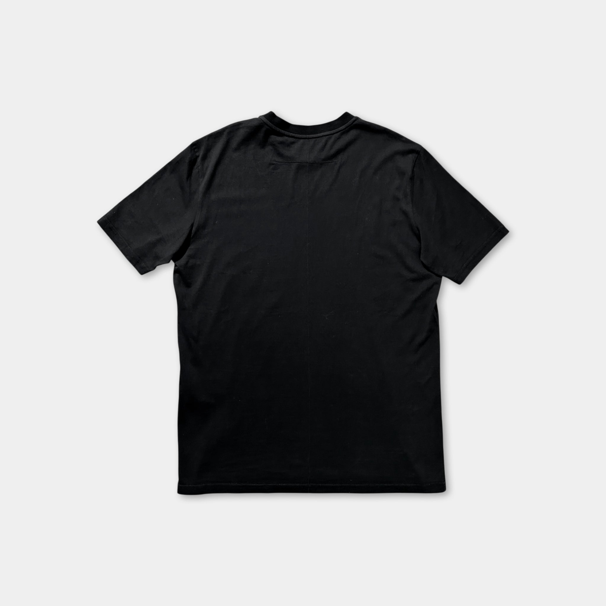 A black t-shirt is shown against a white background.