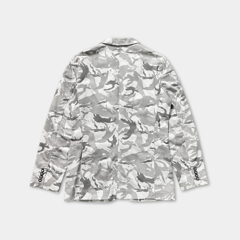 A camouflage-patterned jacket with long sleeves, displayed against a plain background.