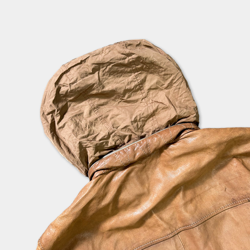 A brown leather jacket with a worn-out appearance, featuring a hood and a collar.