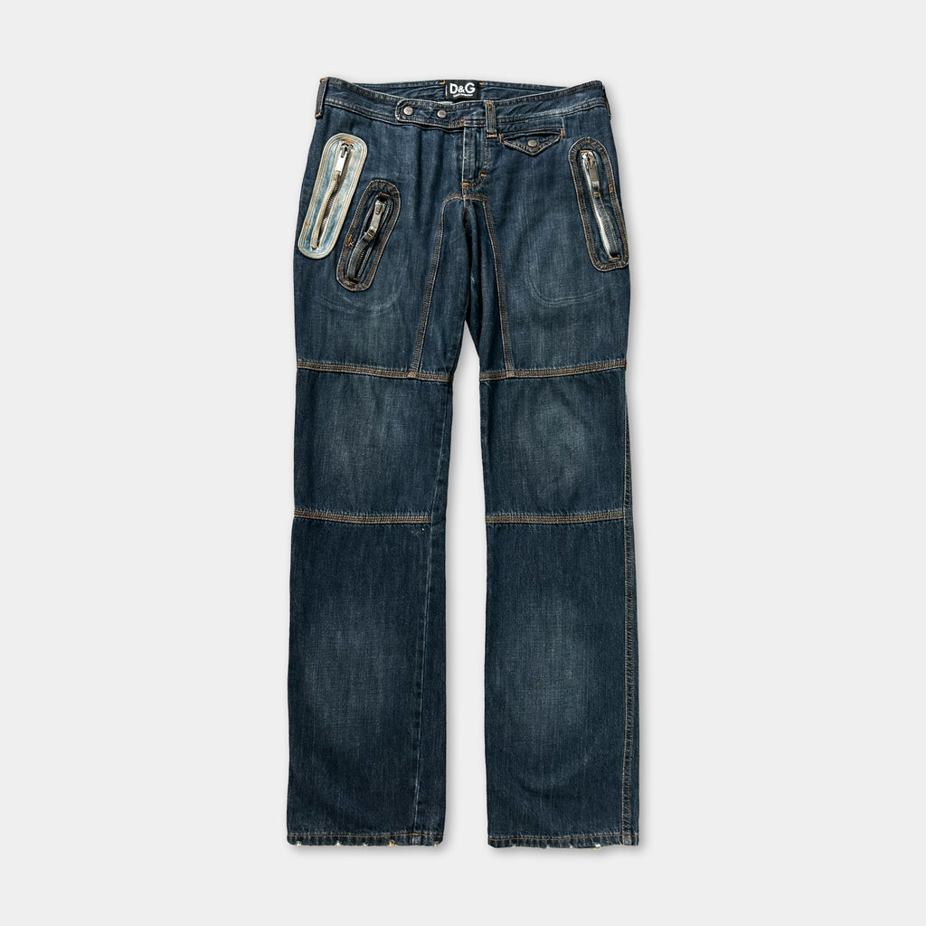 A pair of blue jeans with multiple pockets and a zipper detail.