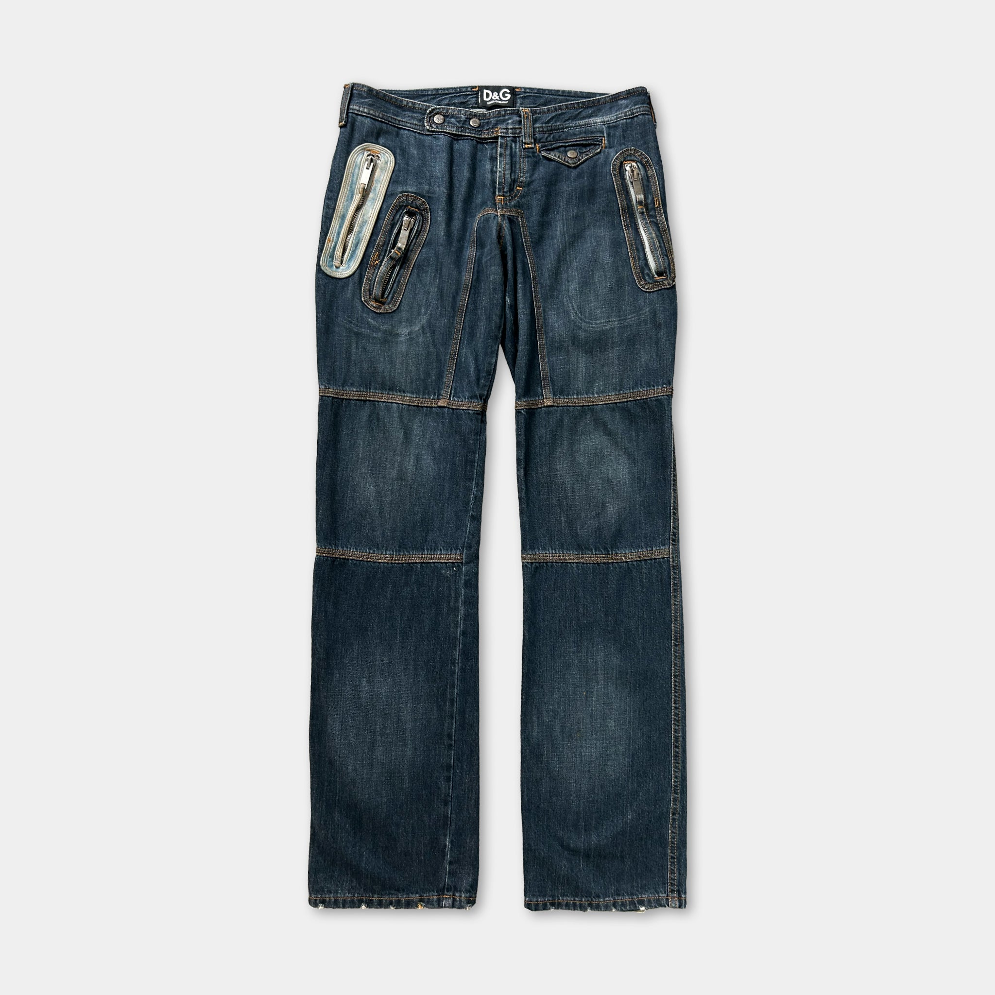 A pair of blue jeans with multiple pockets and a zipper detail.