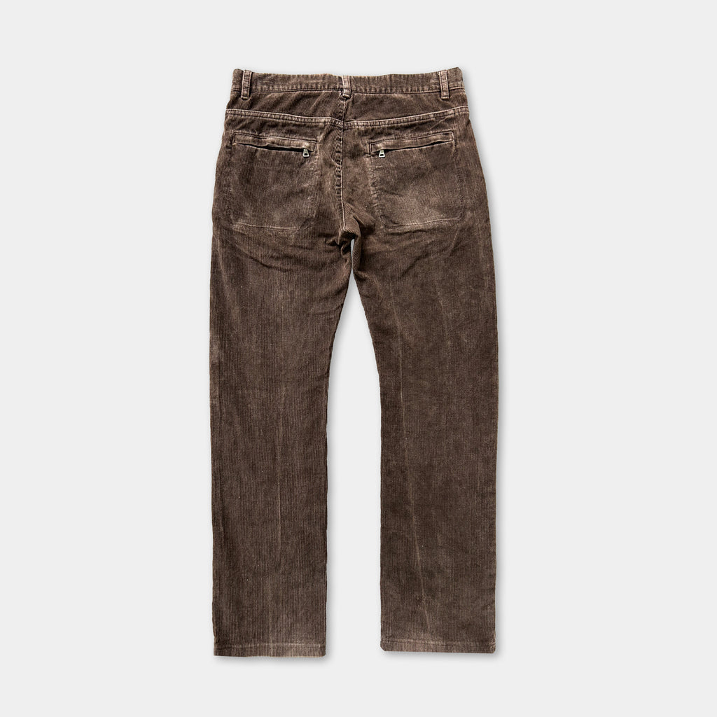 A pair of brown corduroy pants with two pockets on the back.
