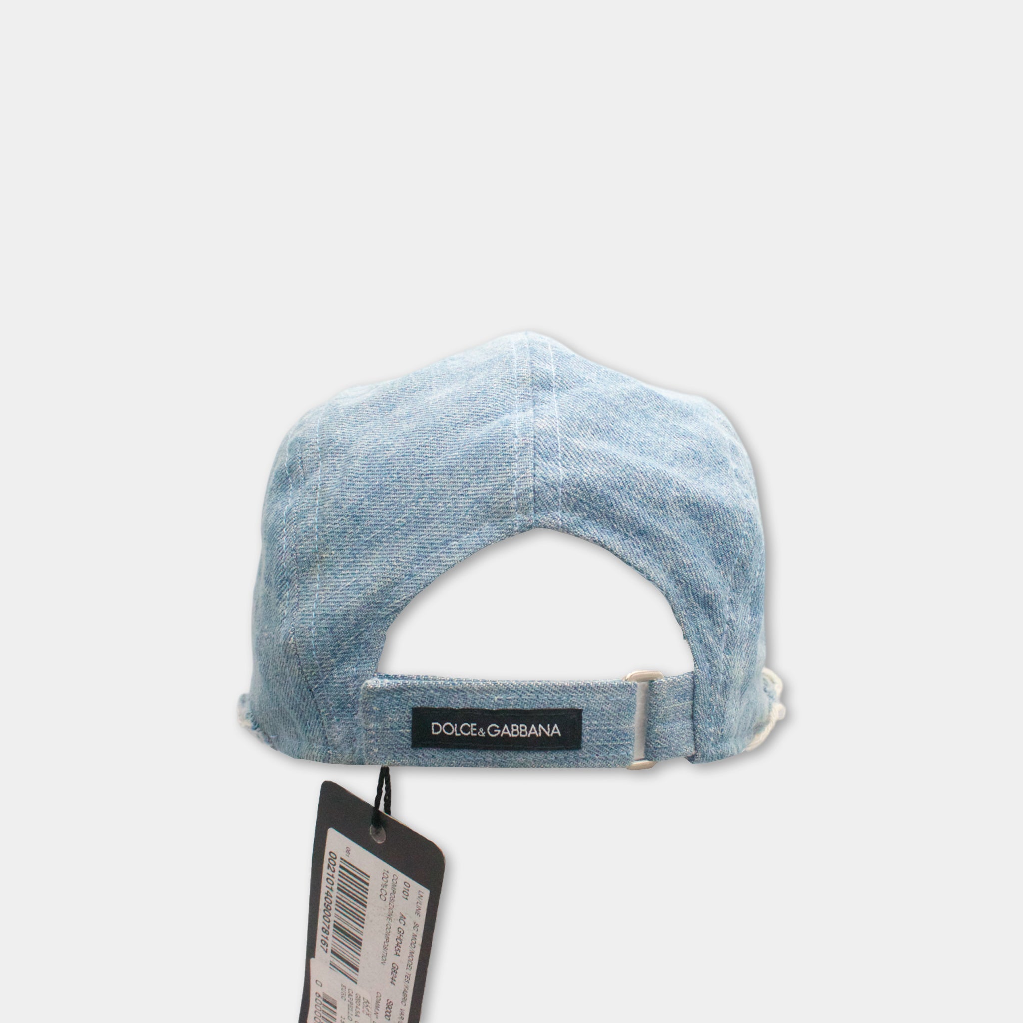A denim-style baseball cap with a tag attached, against a plain white background.
