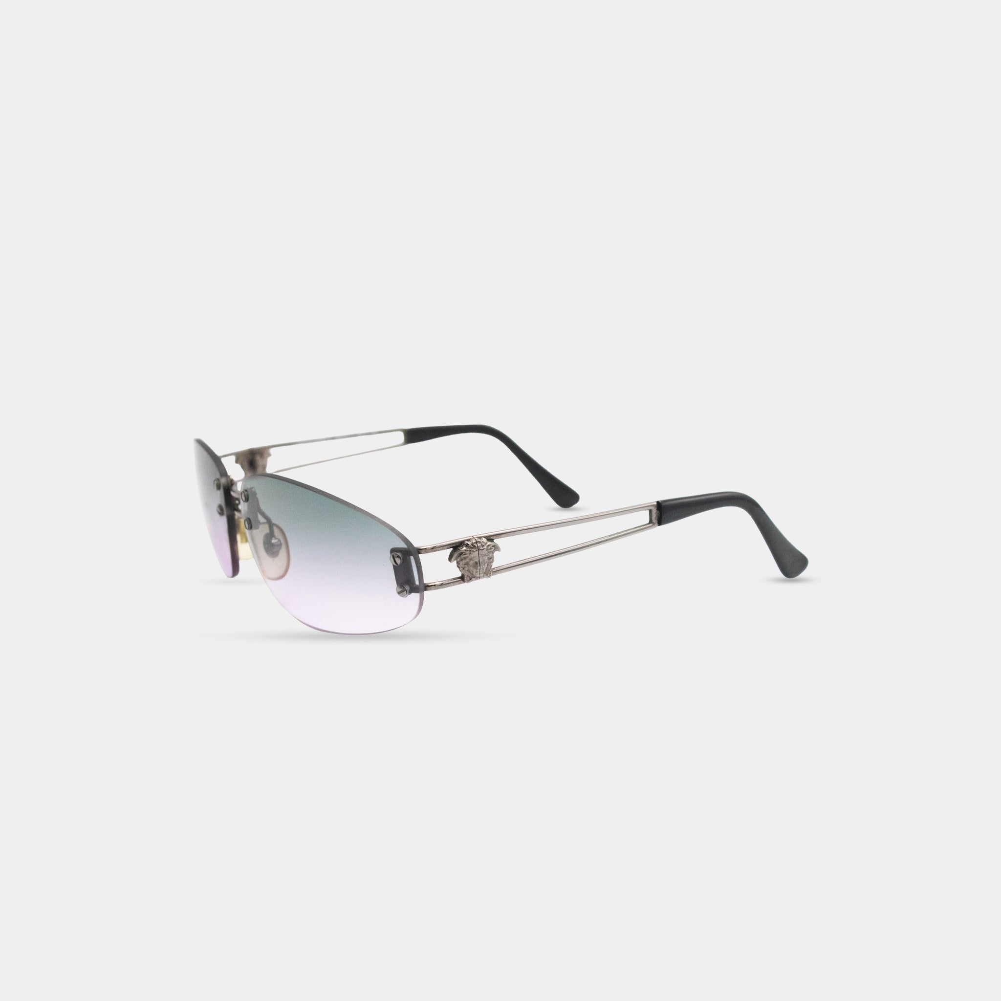 A pair of sunglasses with a silver frame and black accents.