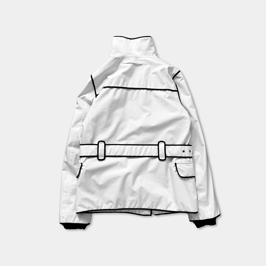 A white jacket with black trim and a black belt, displayed against a plain background.