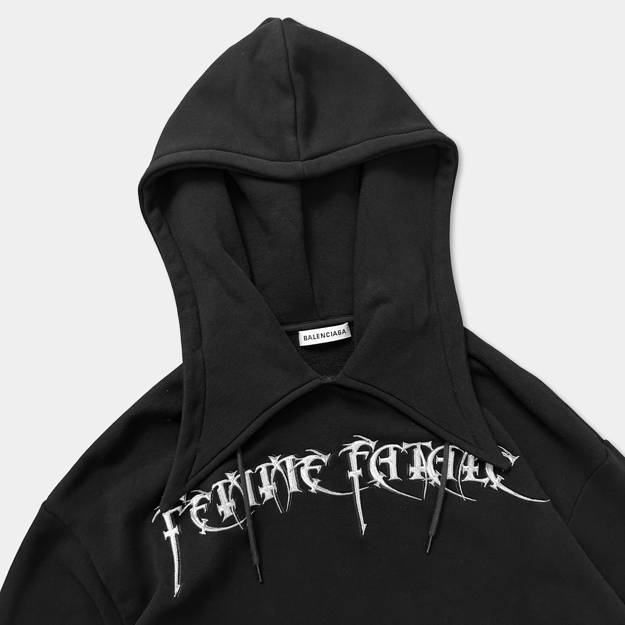 A black hoodie with the text "FUTURE FAMILIES" printed on it.